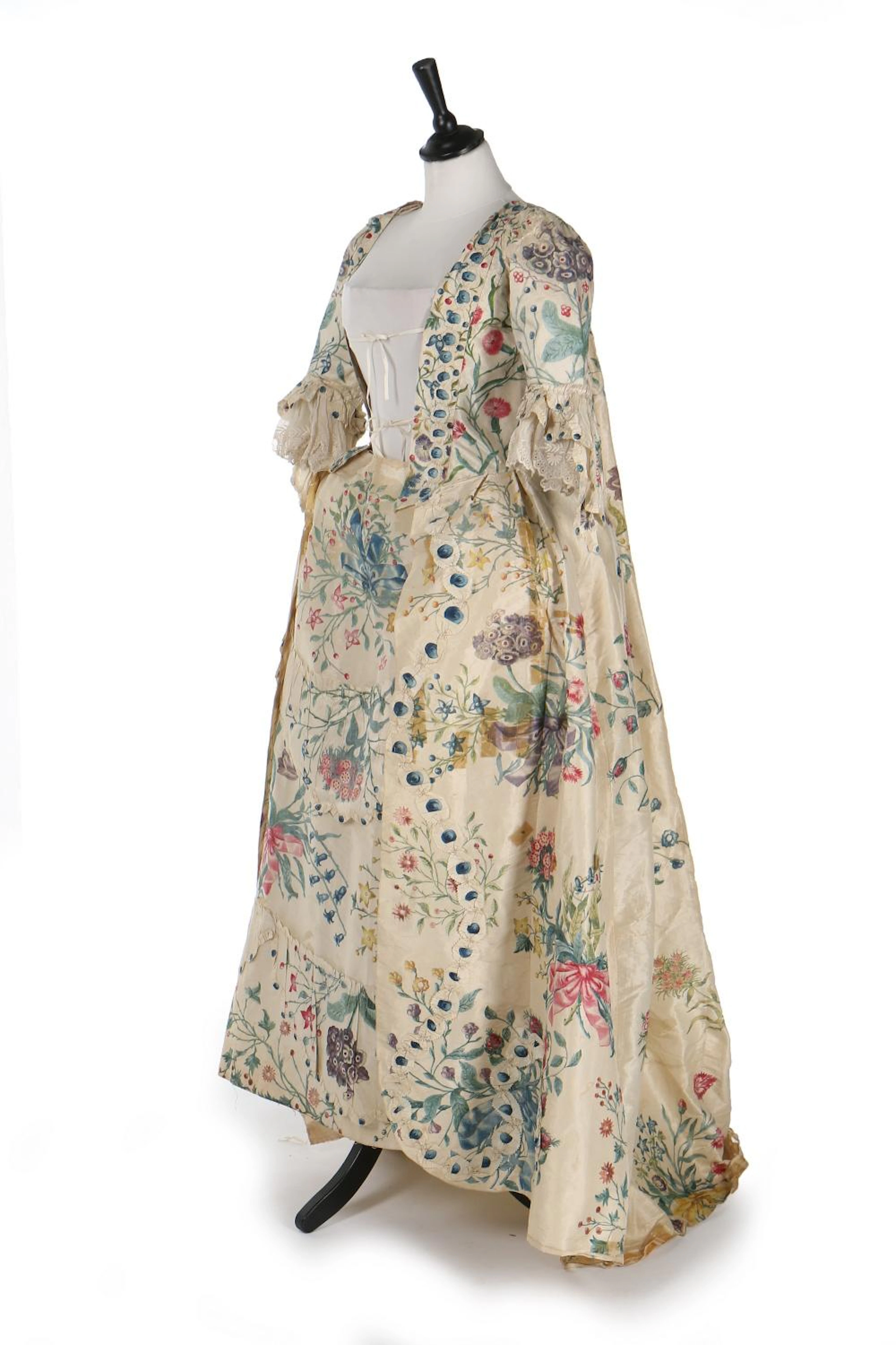 A painted silk robe à la Francaise, English, 1760s-70s, the ivory silk pain
