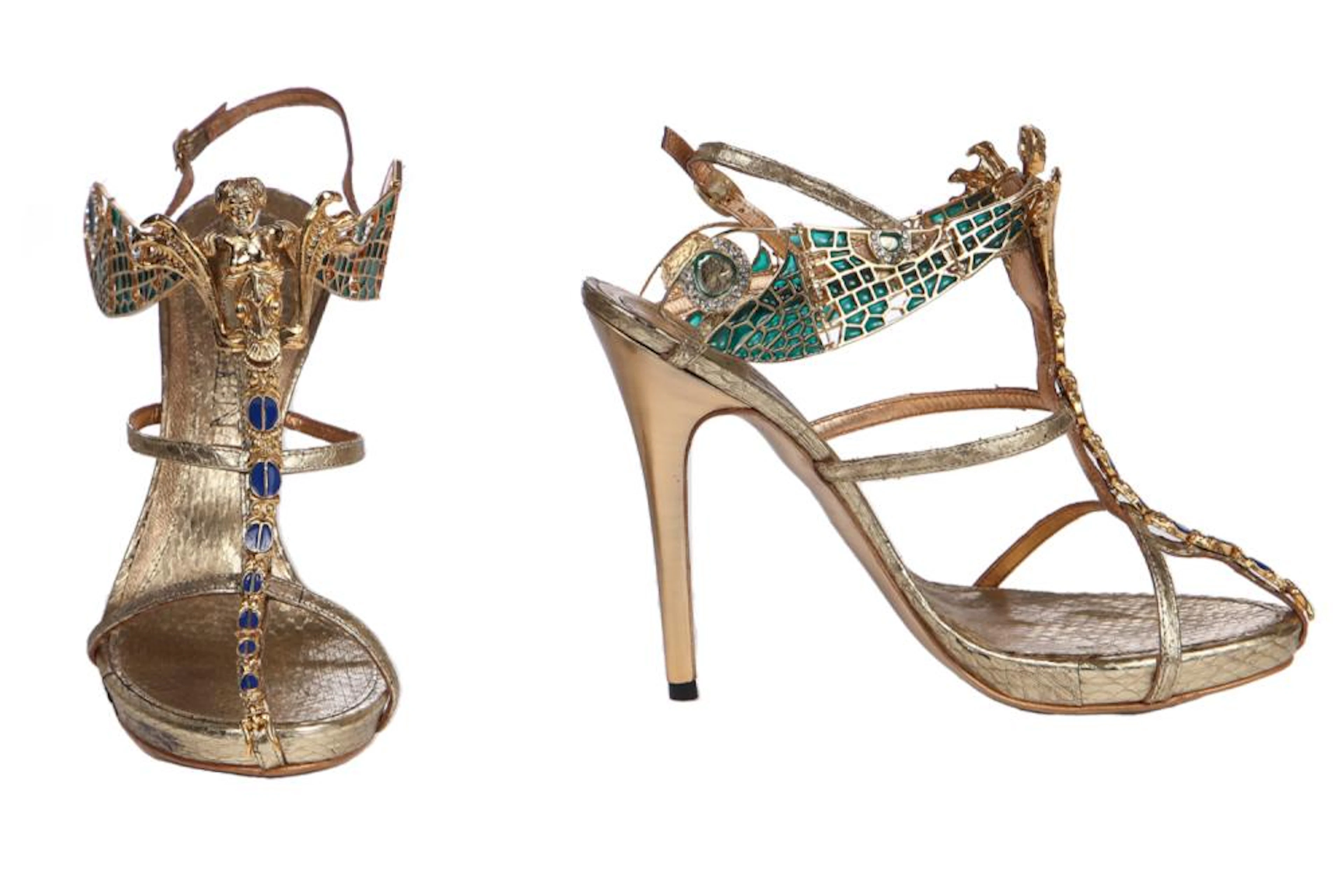 A pair of rare Alexander McQueen gold snakeskin heels