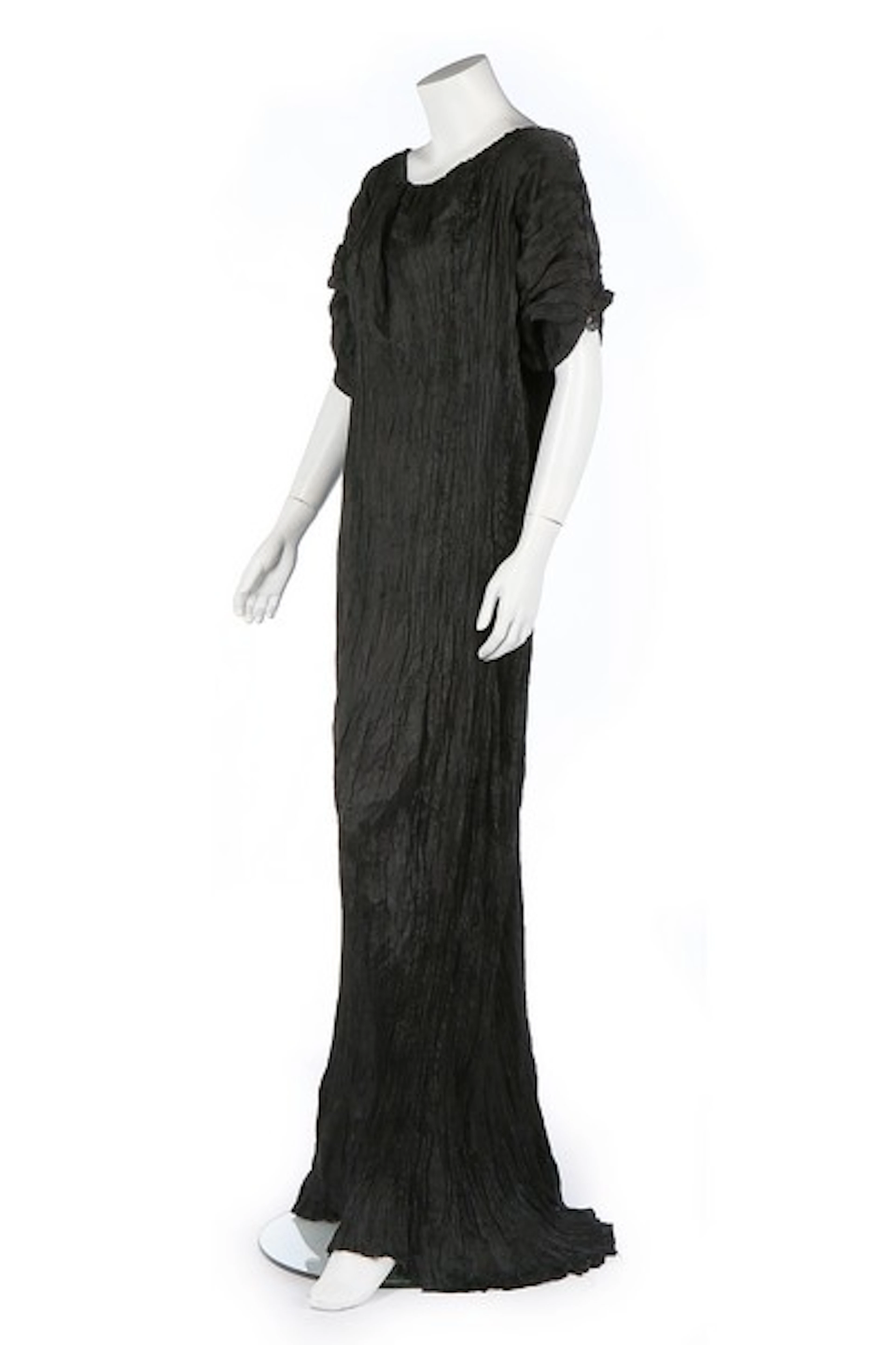A Mariano Fortuny black pleated silk Delphos gown, 1920-30, signed to left