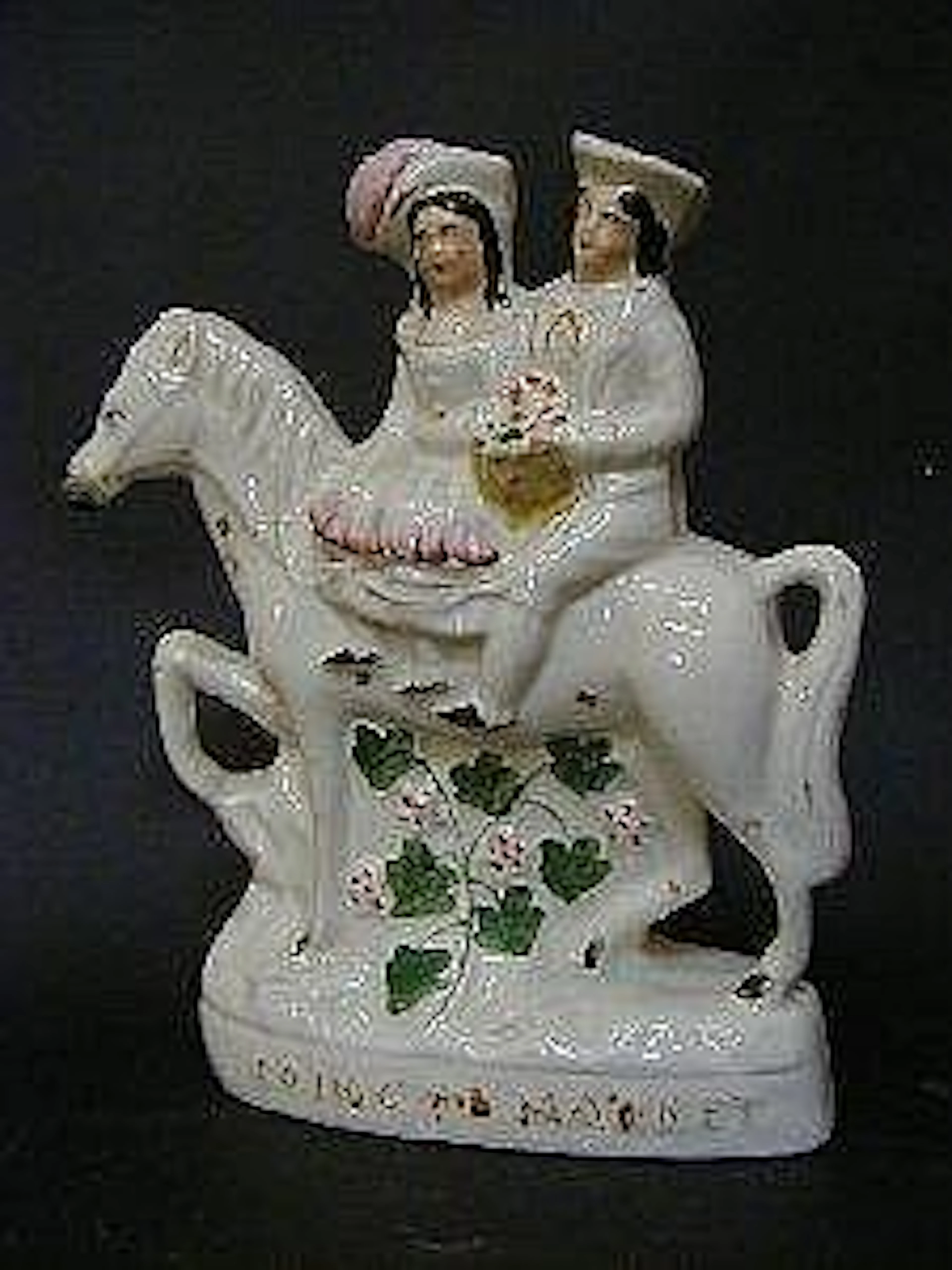 A STAFFORDSHIRE FLATBACK EQUESTRIAN FIGURE GROUP