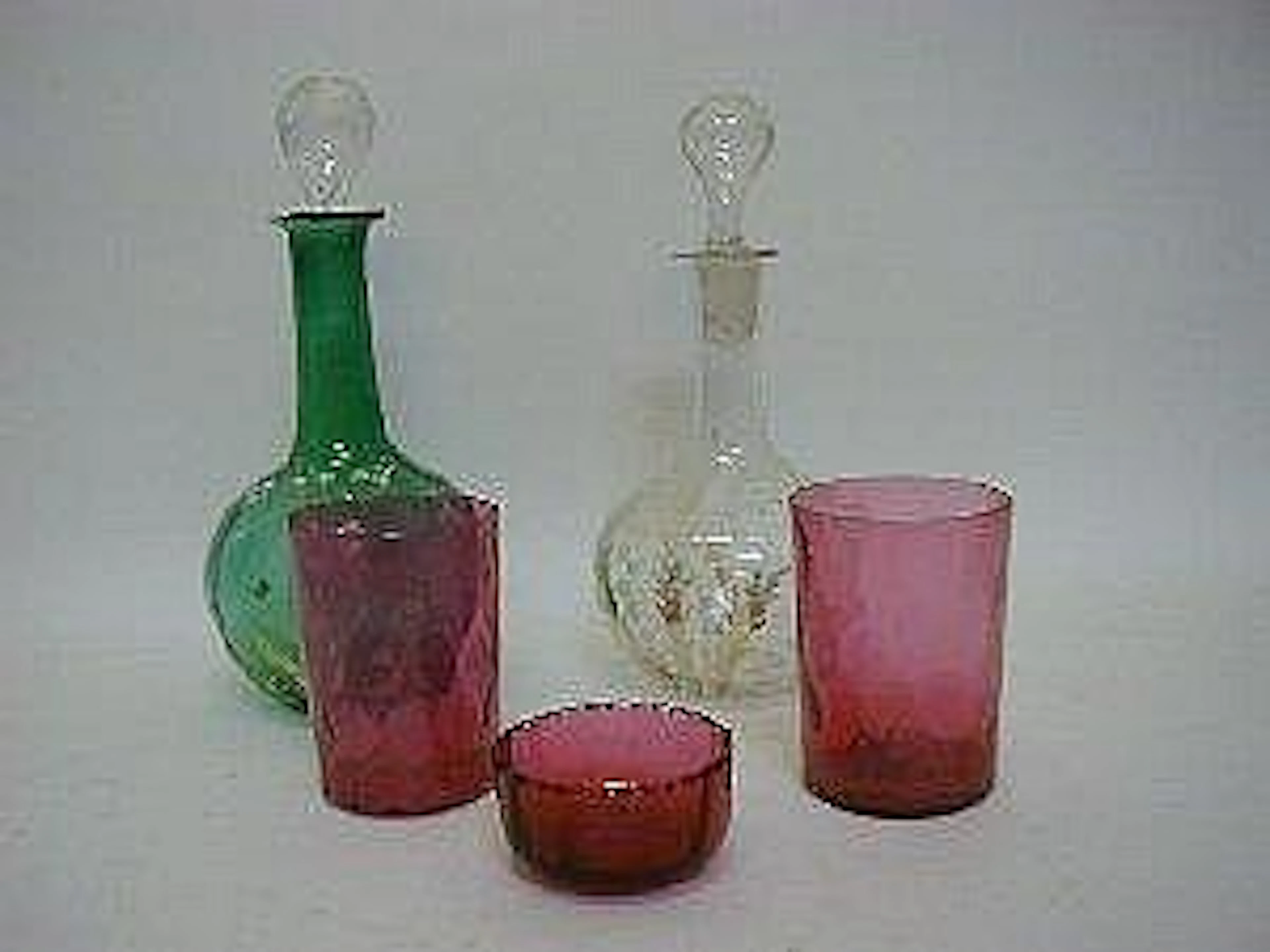 A PAIR OF RUBY GLASS BEAKERS