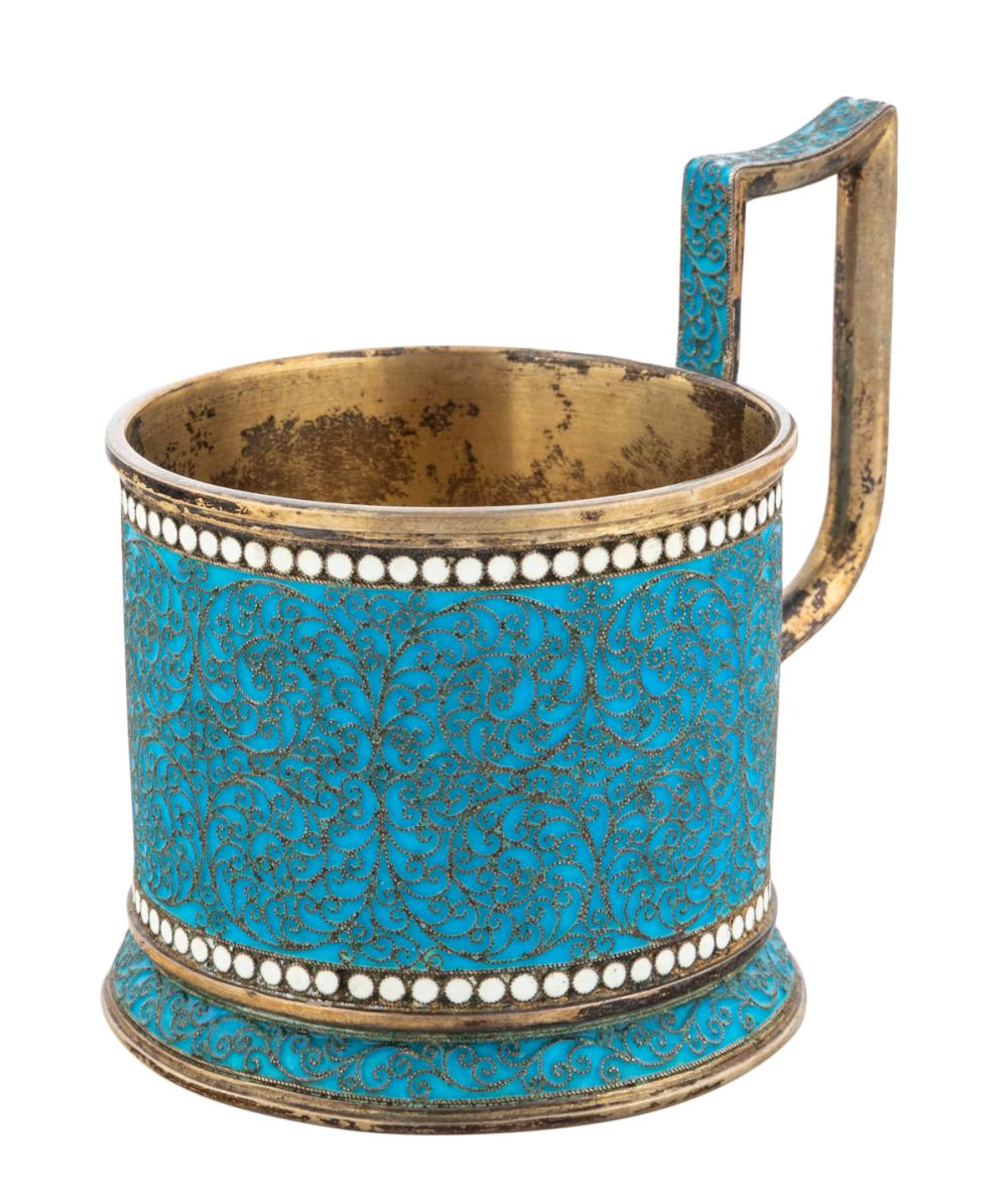 A RUSSIAN GILT SILVER AND CLOISONNE ENAMEL PODSTAKANNIK