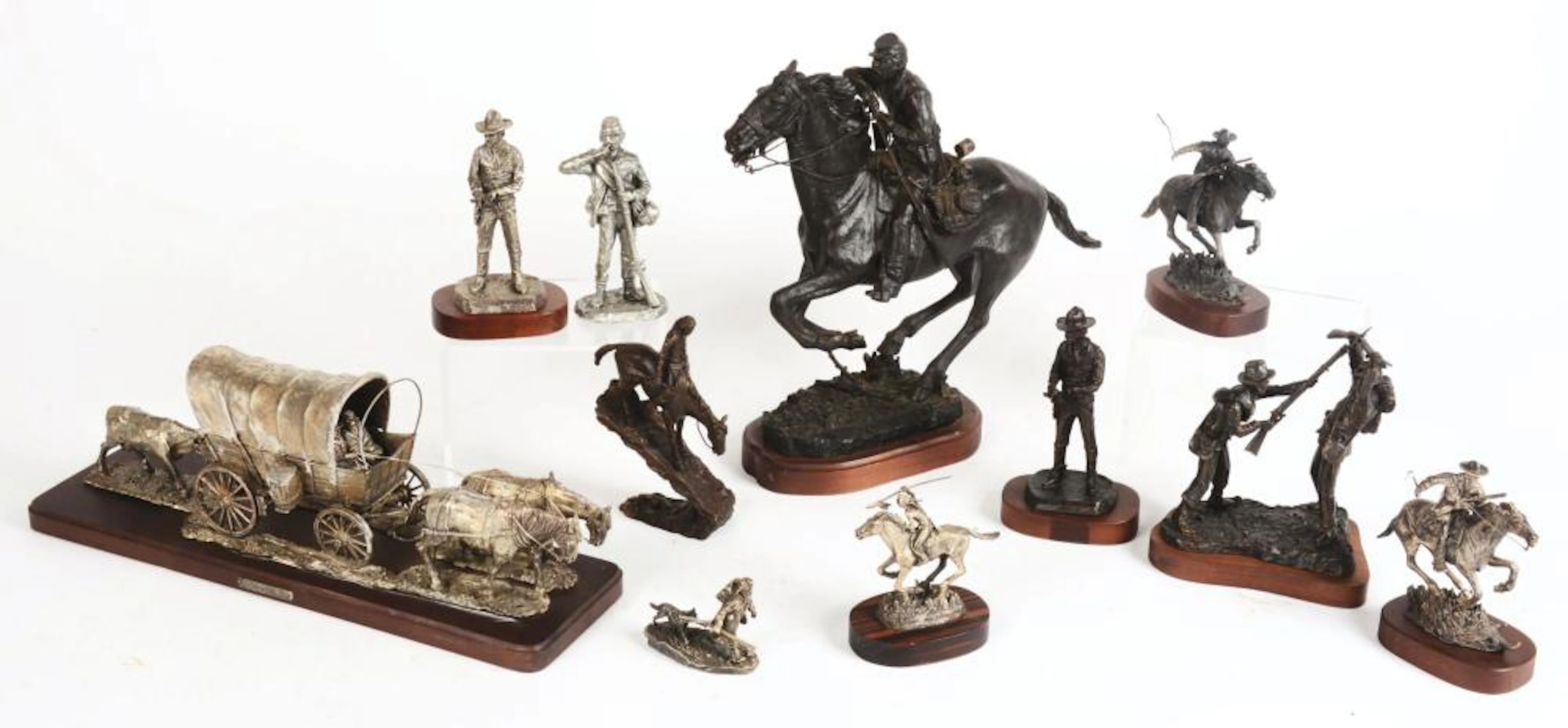 LOT OF 11: BRONZE, STERLING AND PEWTER FIGURINES.