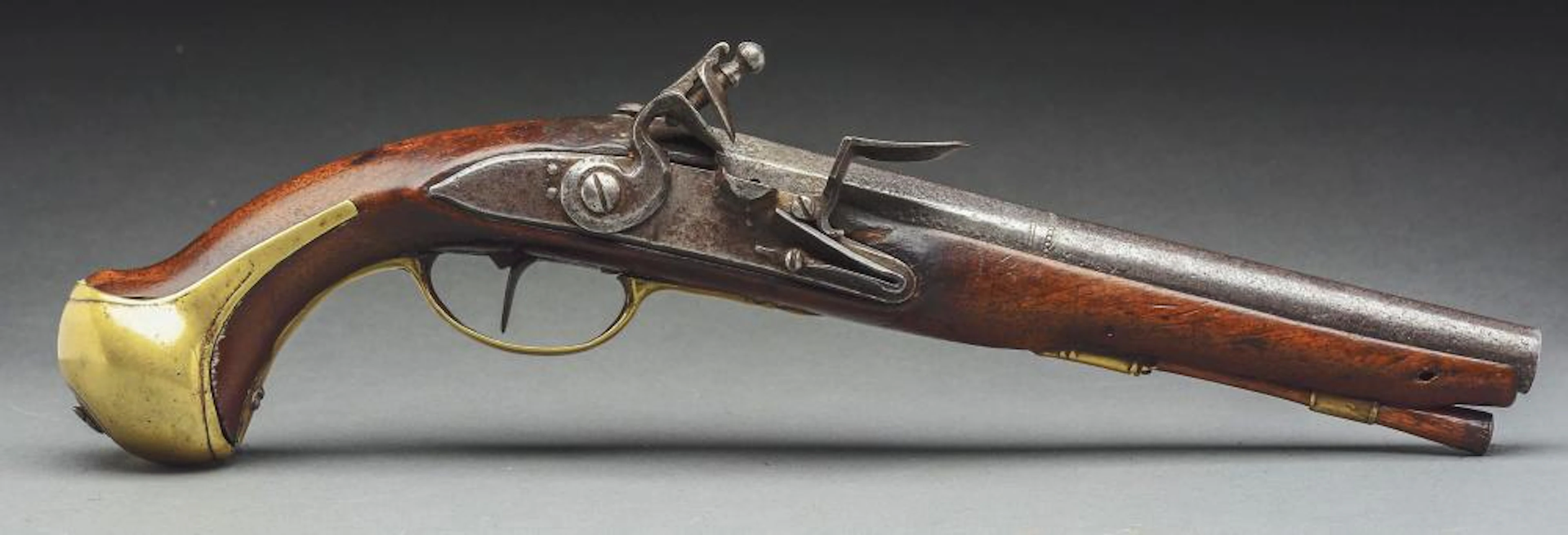(A) Early American Flintlock Holster Pistol.