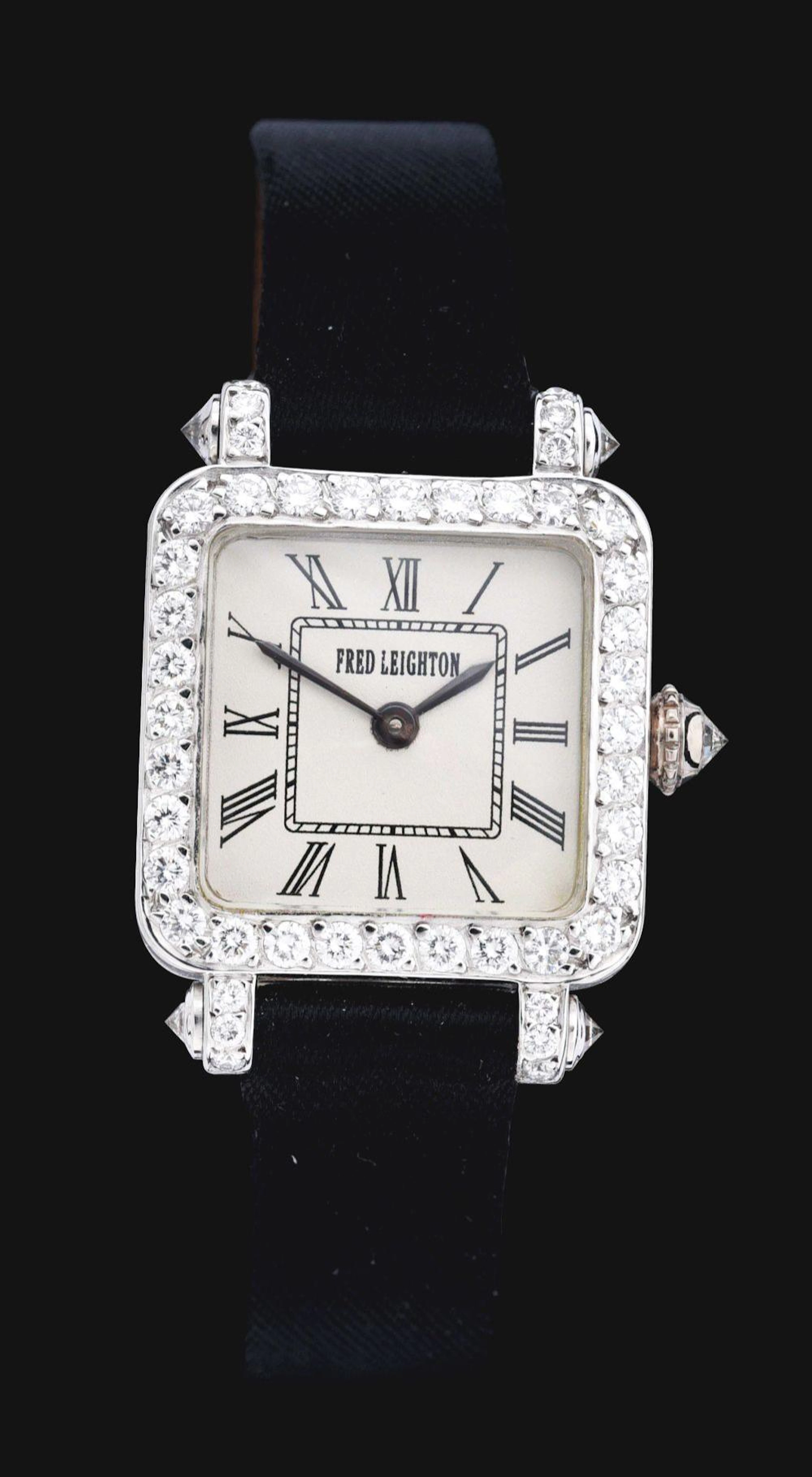 LADY'S 18K WHITE GOLD & DIAMOND FRED LEIGHTON FRENCH WRISTWATCH W/BOX.