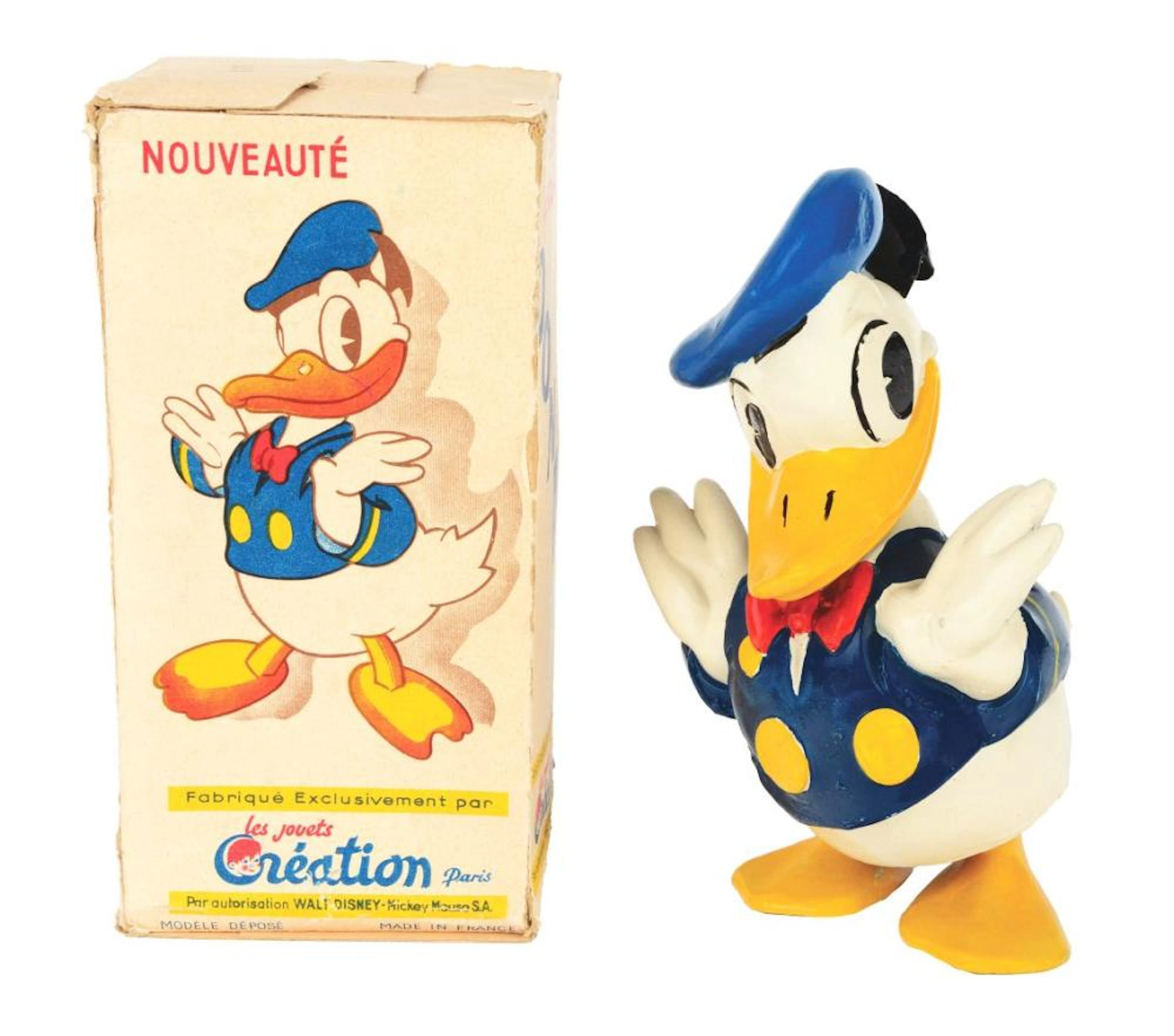 FRENCH MECHANICAL COMPOSITION WALT DISNEY DONALD DUCK WALKING TOY.