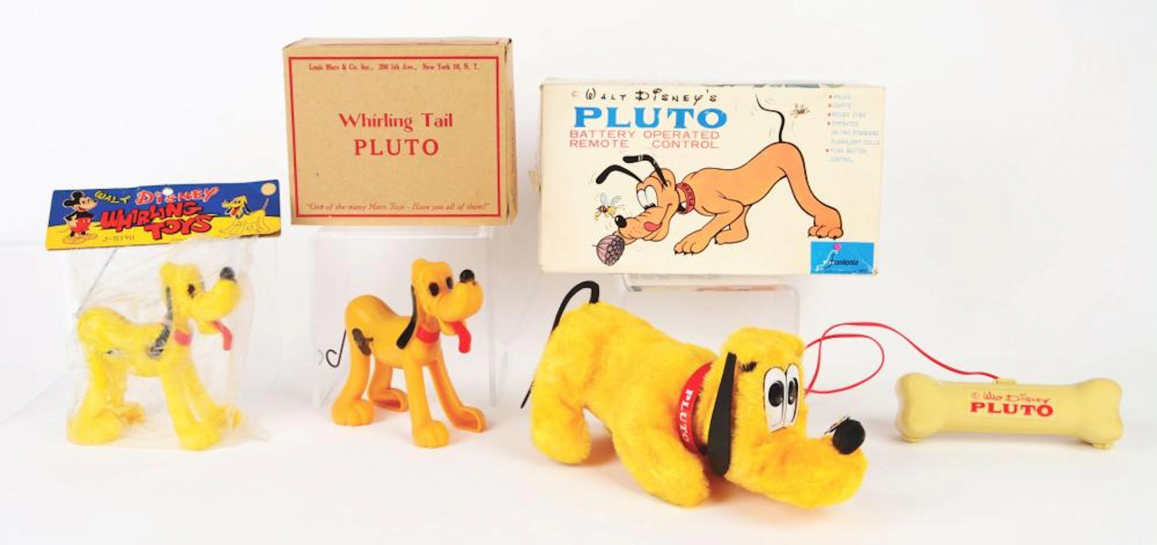 LOT OF 3: WALT DISNEY PLUTO BATTERY-OPERATED AND WIND-UP TOYS.