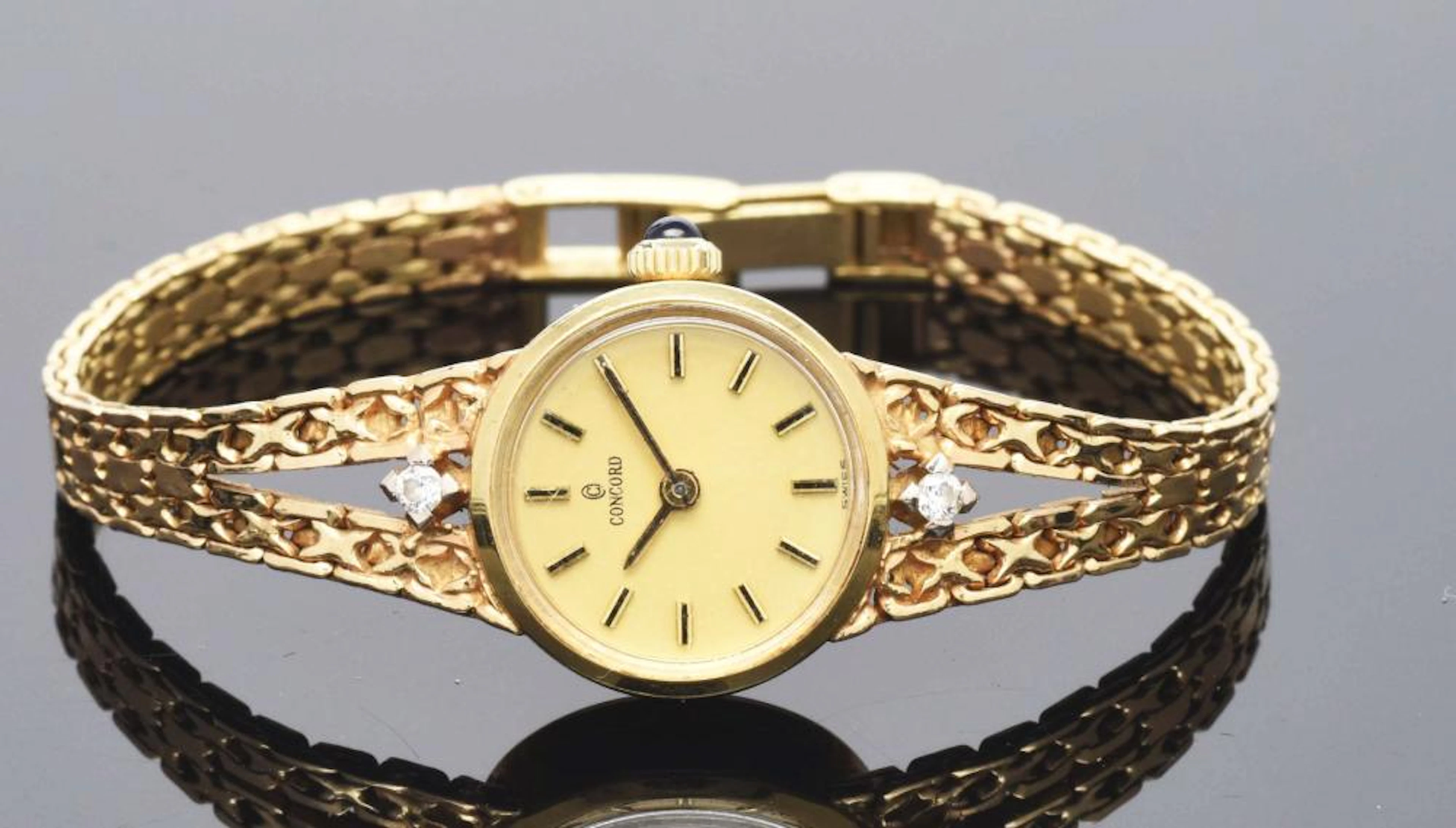Ladies 14K Gold Concord Swiss Diamond Wristwatch.
