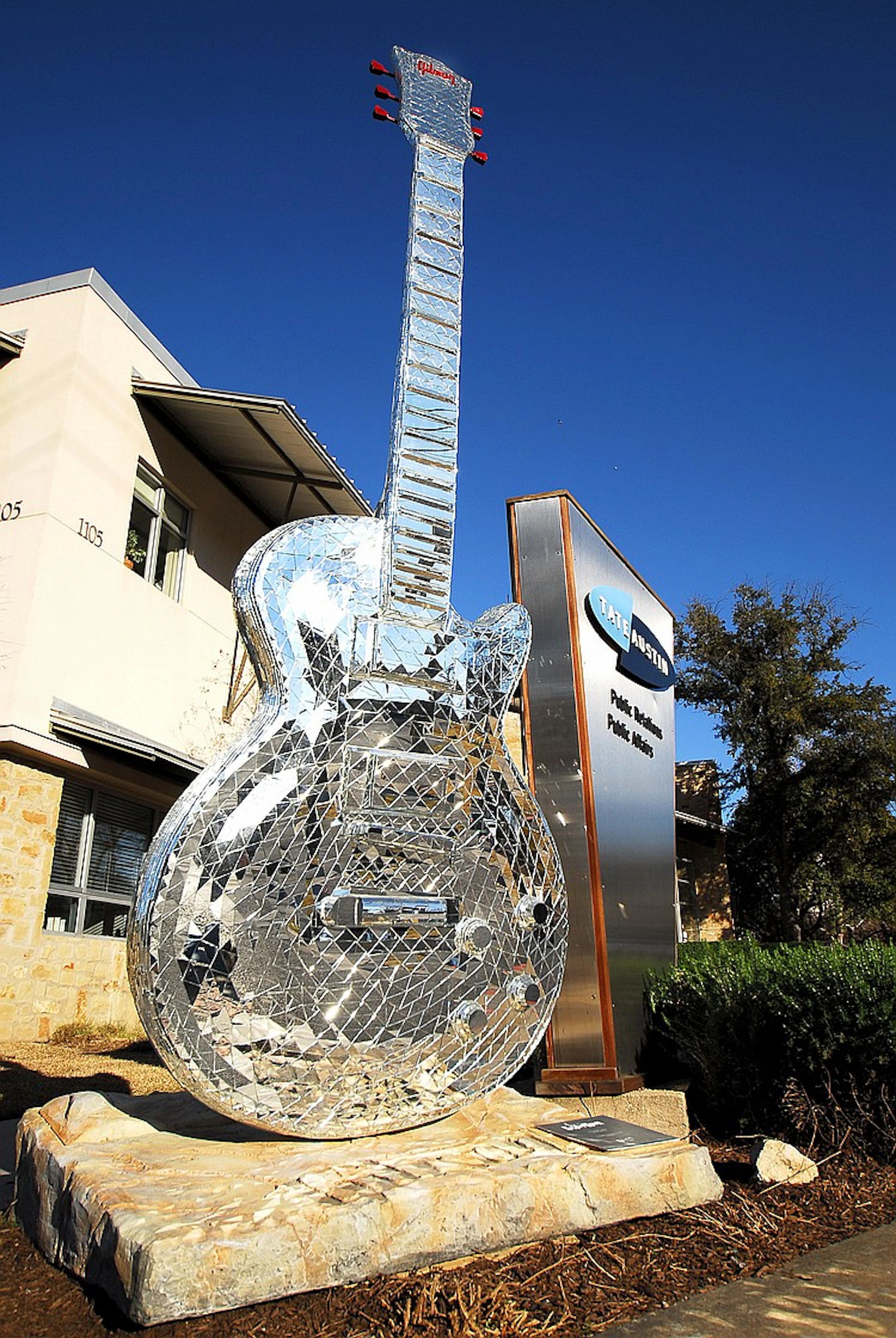 REFLECTIONS OF AUSTIN GIBSON GUITAR SCULPTURE