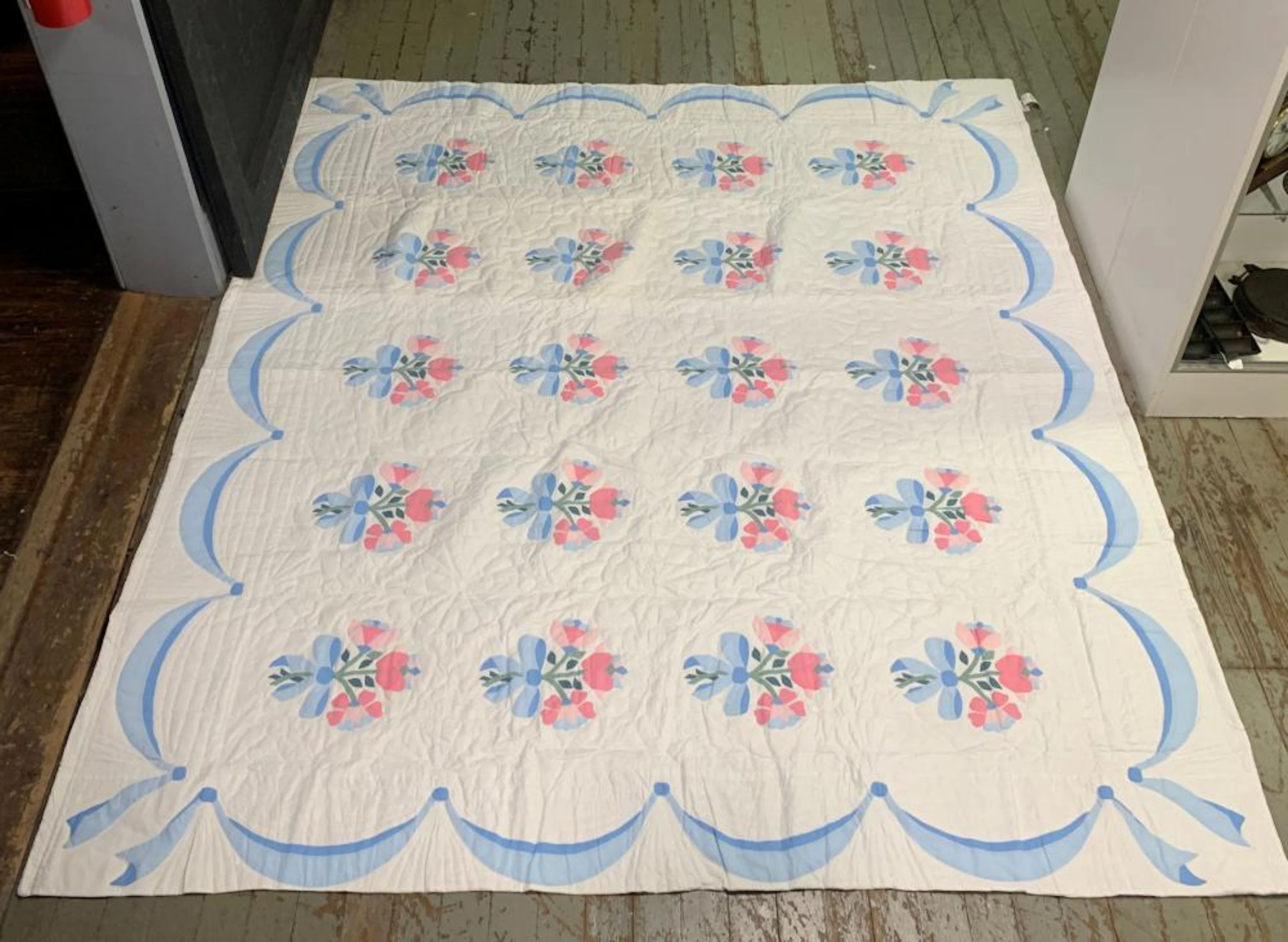 Blue And Floral Handsewn Quilt