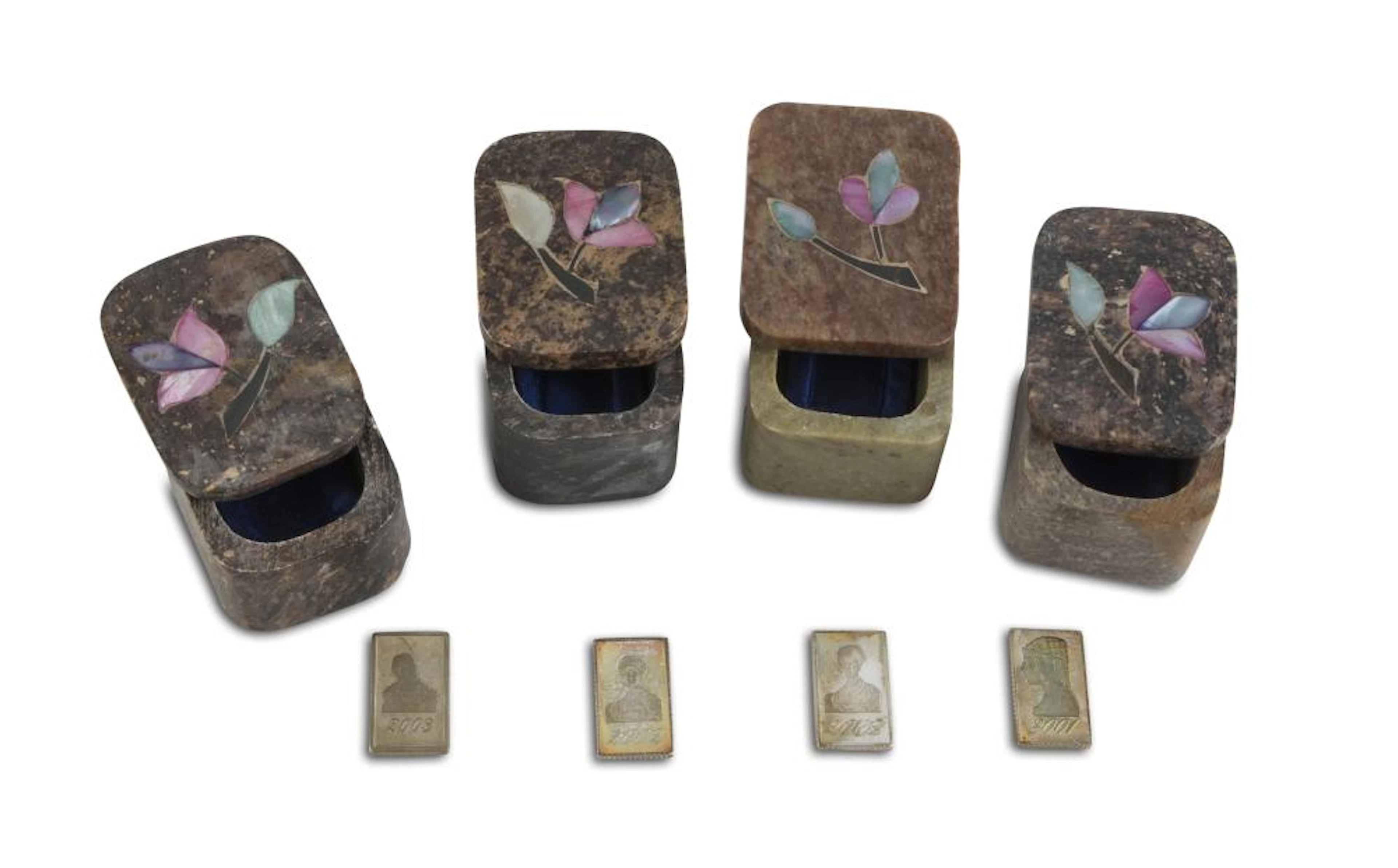 FOUR SMALL SILVER INGOTS