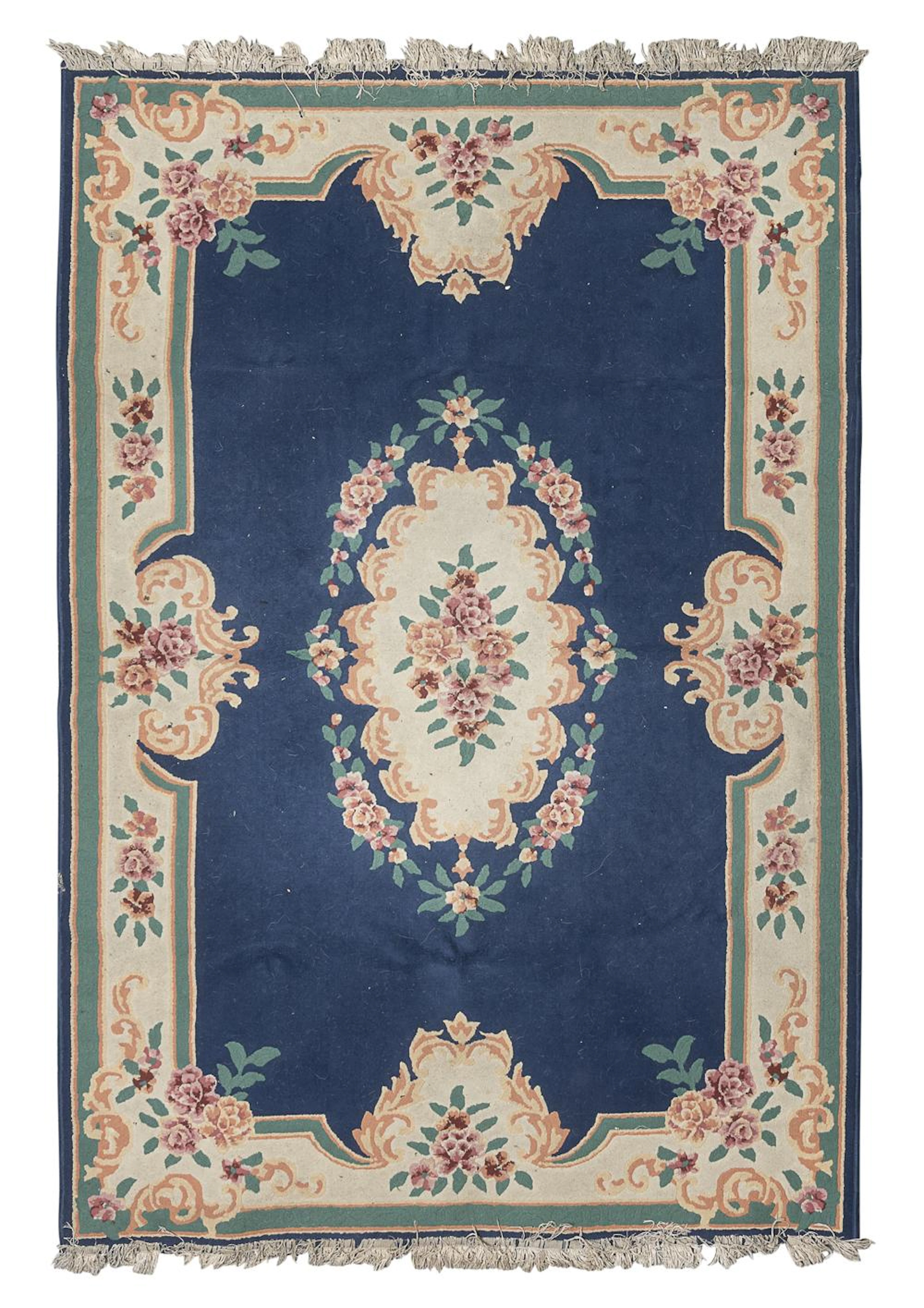 A CHINESE RUG, 20TH CENTURY.