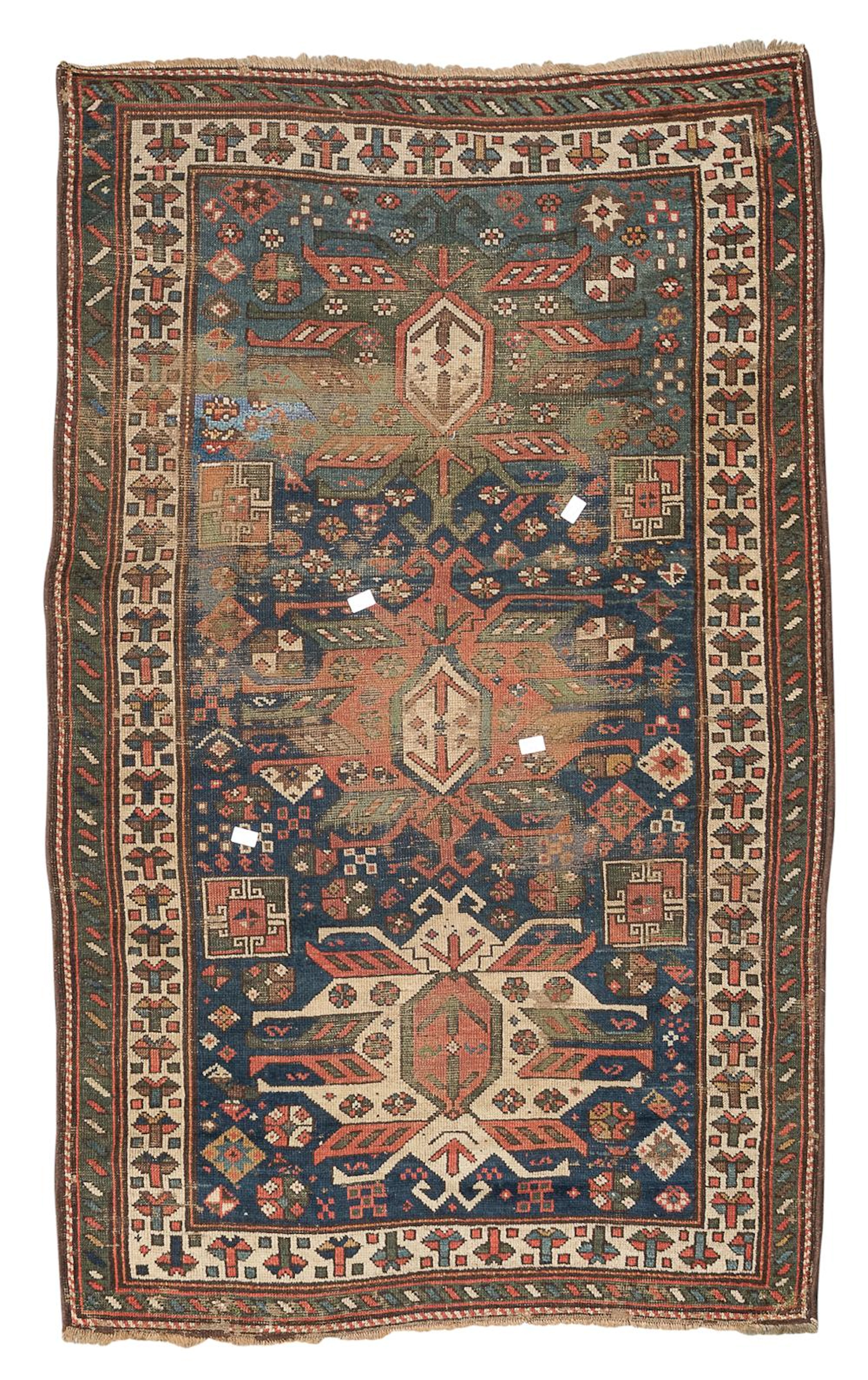 A SHIRAZ RUG, 19TH CENTURY. WEAR.
