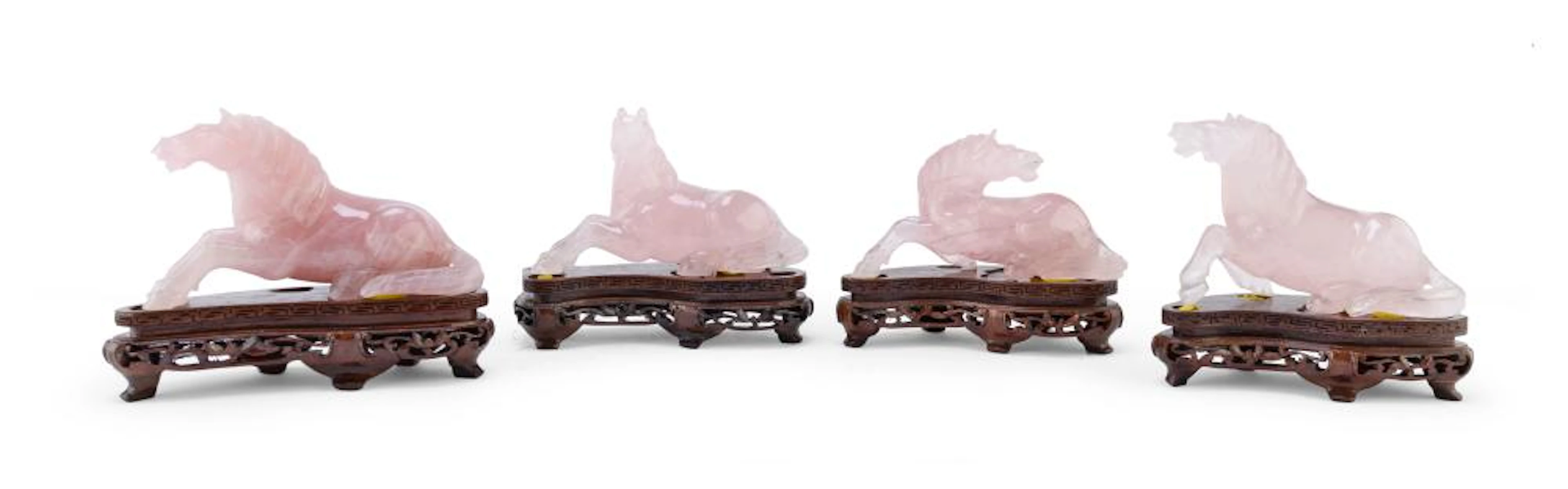 EIGHT CHINESE PINK QUARTZ SCULPTURES OF HORSES, 20TH CENTURY.