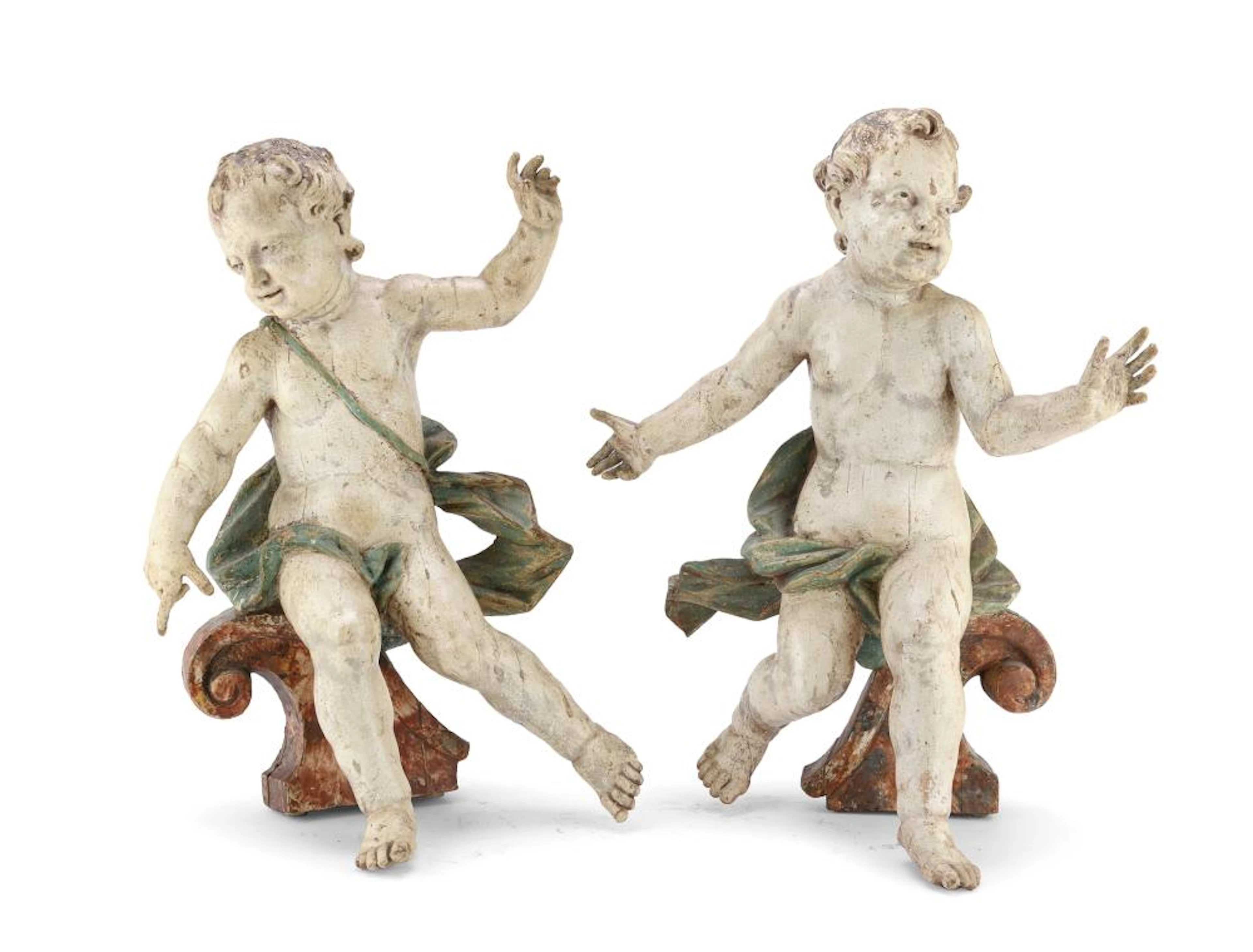 PAIR OF LACQUERED WOOD SCULPTURES OF PUTTI, CENTRAL ITALY, 18TH CENTURY