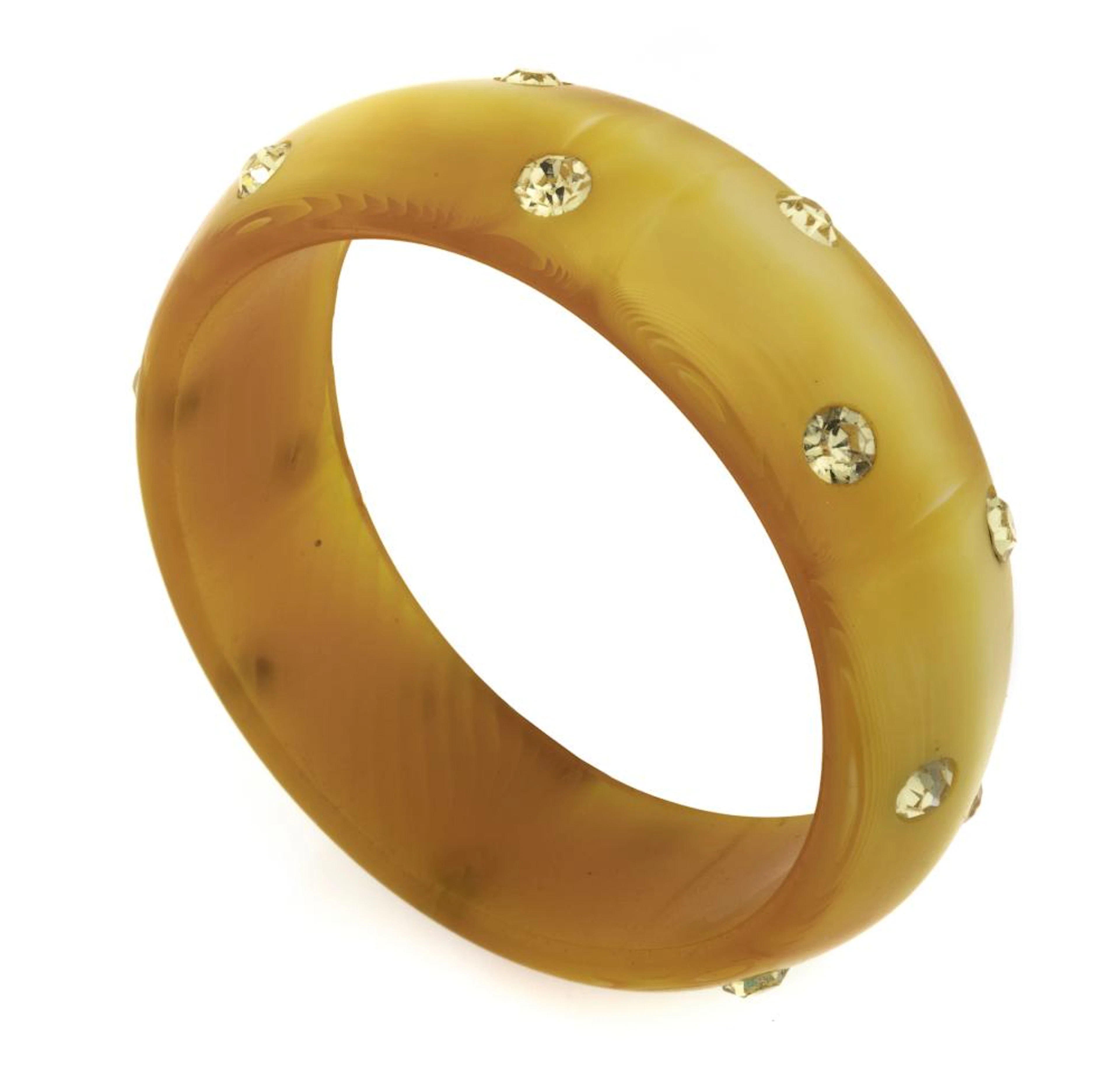 BANGLE IN YELLOW BAKELITE AND STRASS