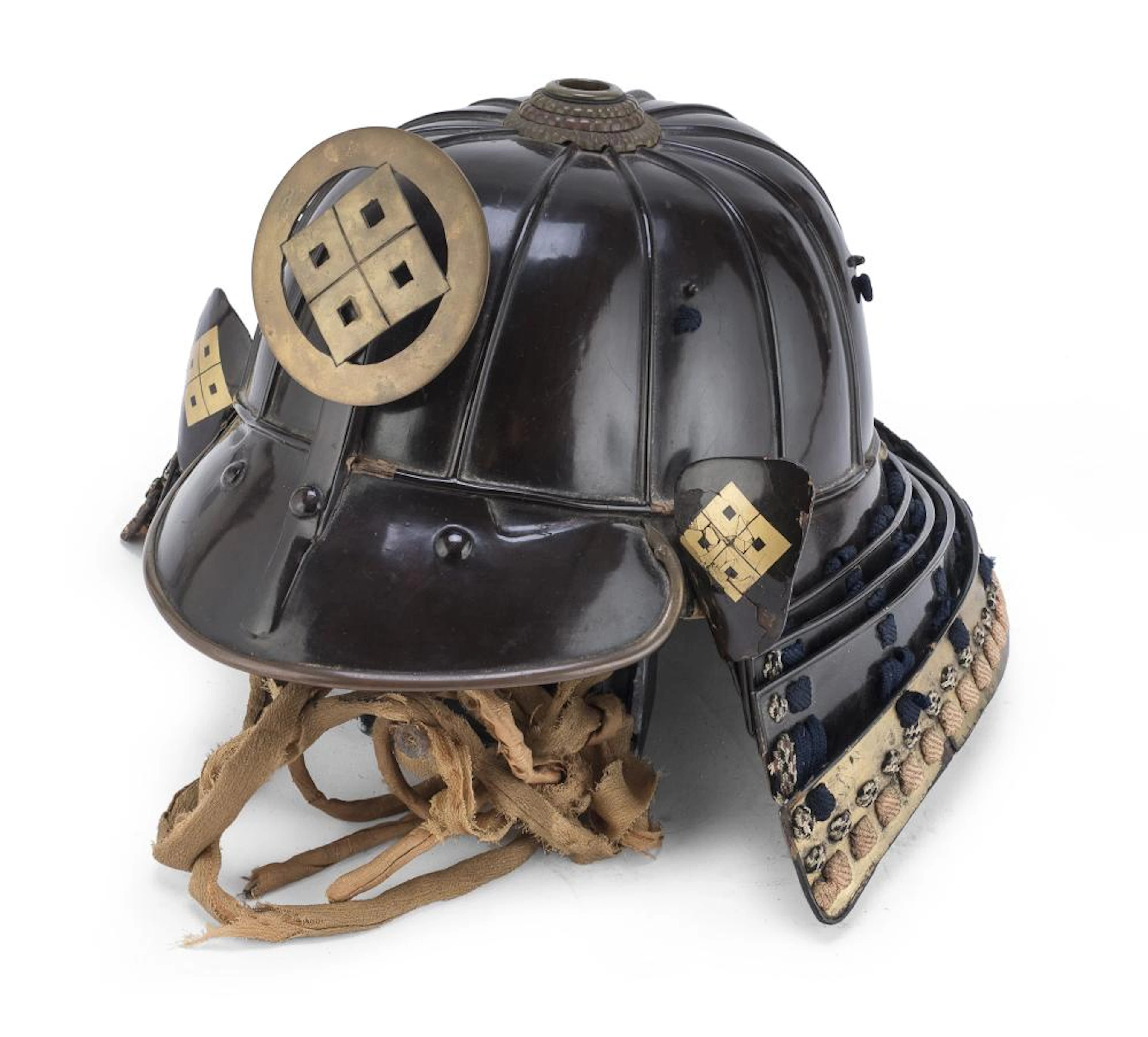 A JAPANESE SAMURAI HELMET IN IRON AND LAQUER