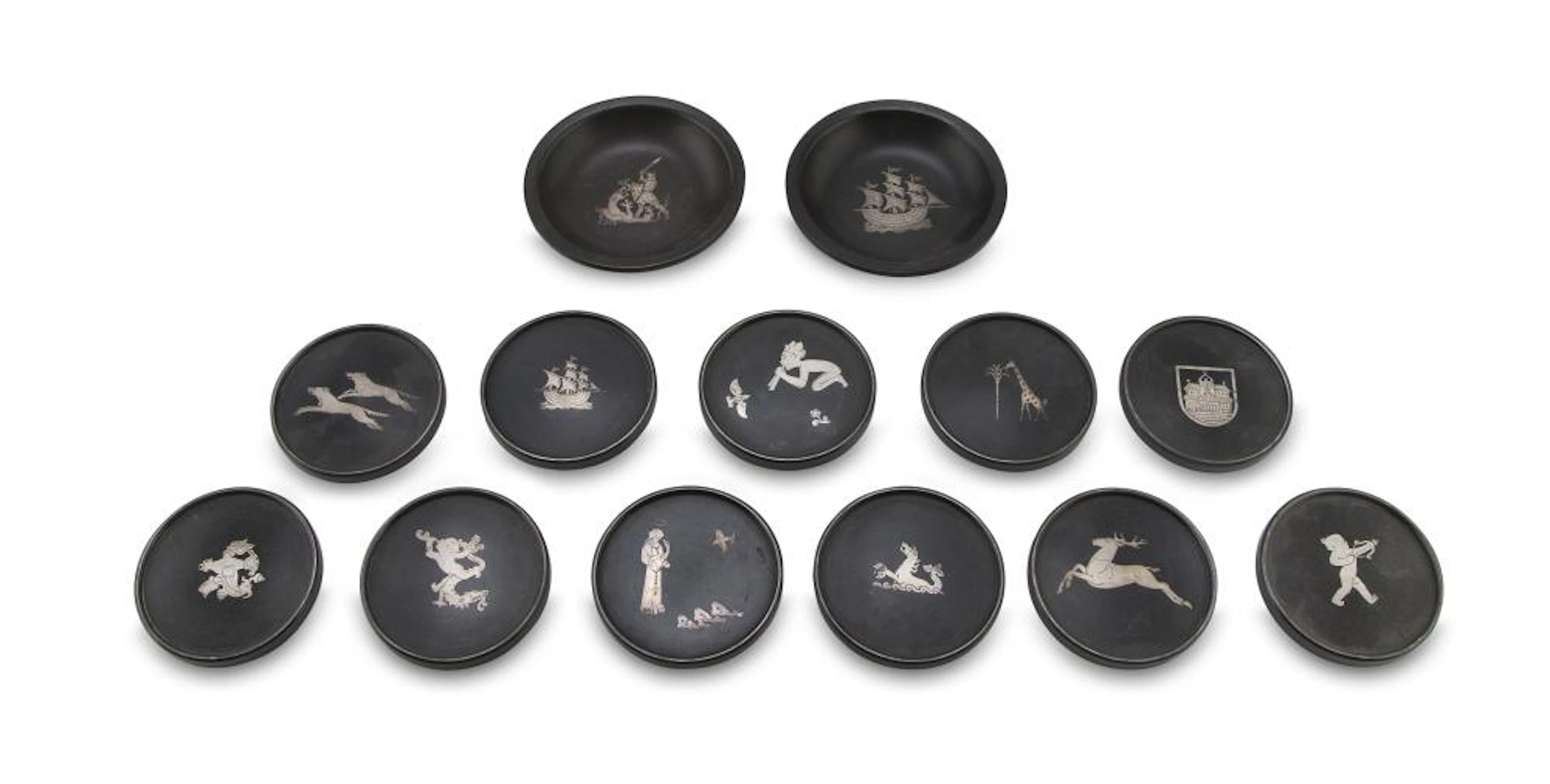ELEVEN COASTERS AND TWO TRAYS ART DECO 1940s