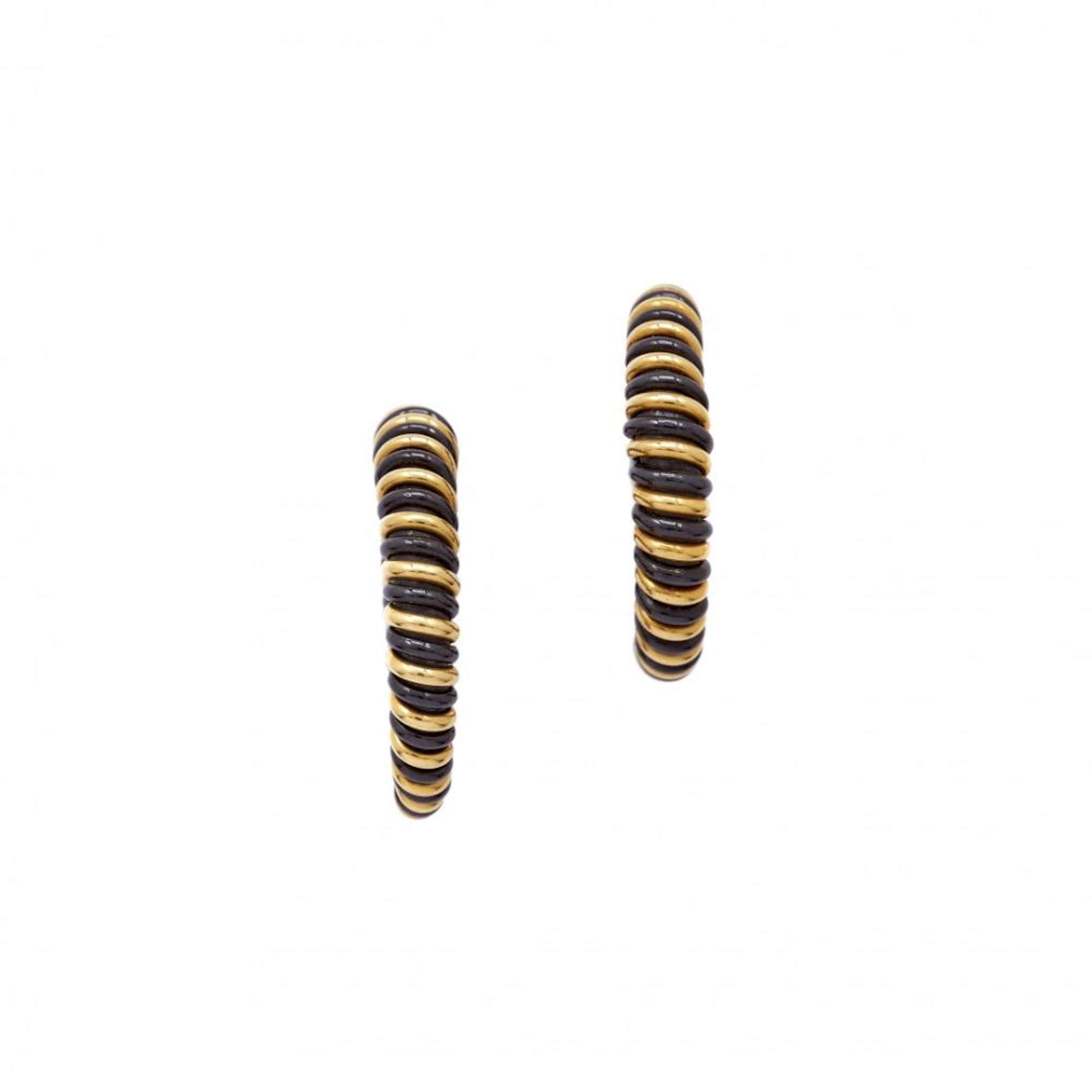 pair of gold and steel hoop earrings