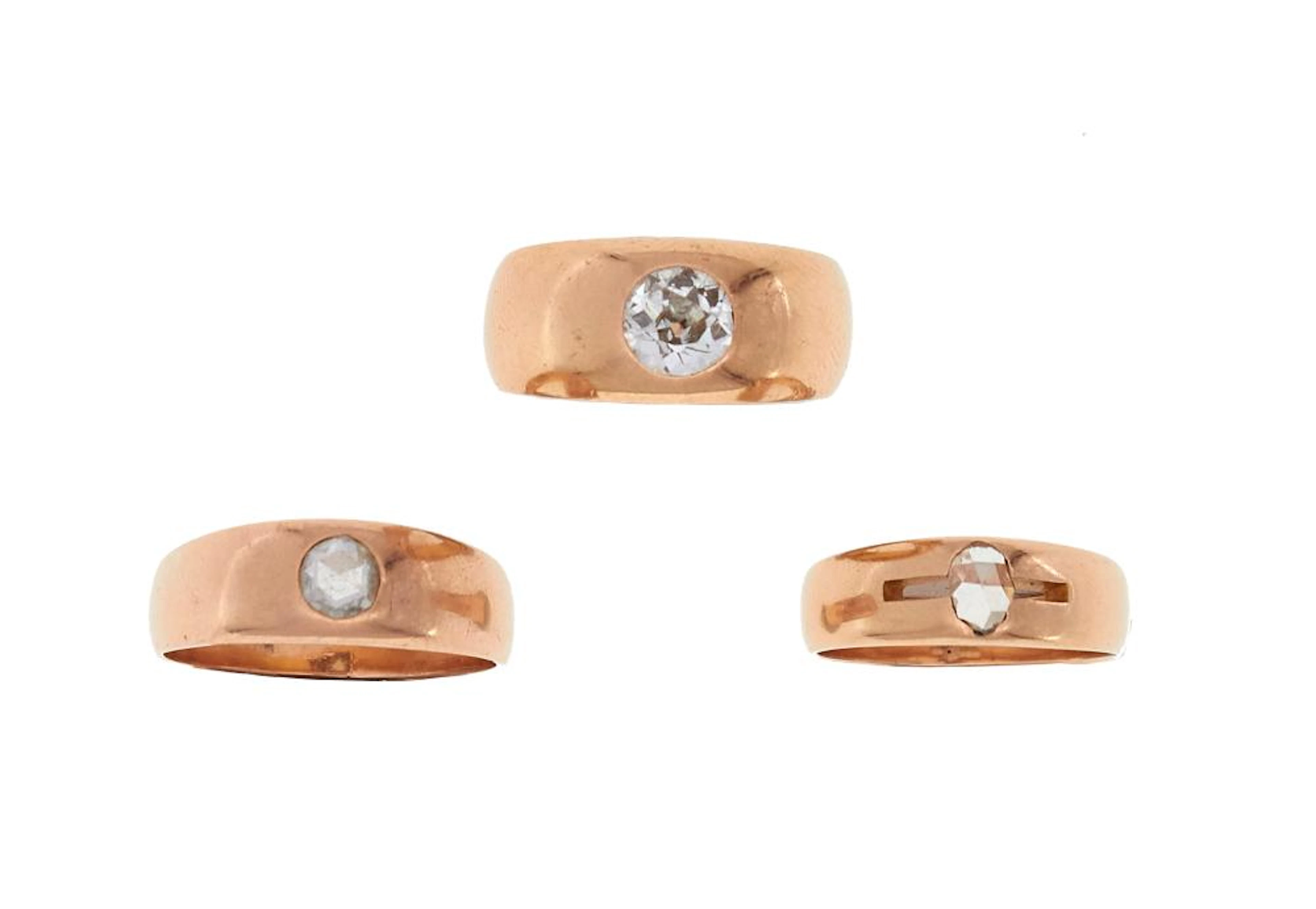 three gent's diamond rings