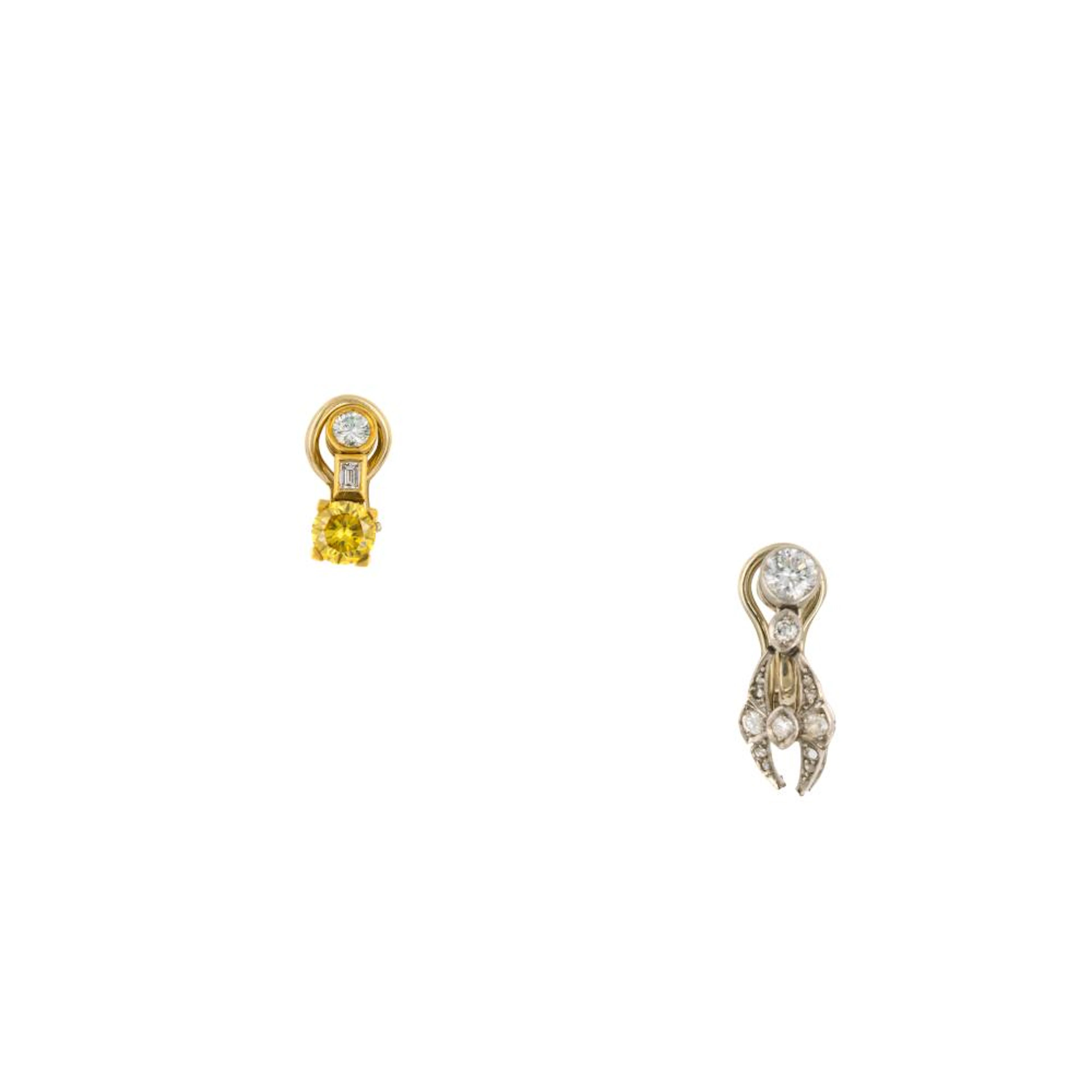 two diamond ear clips