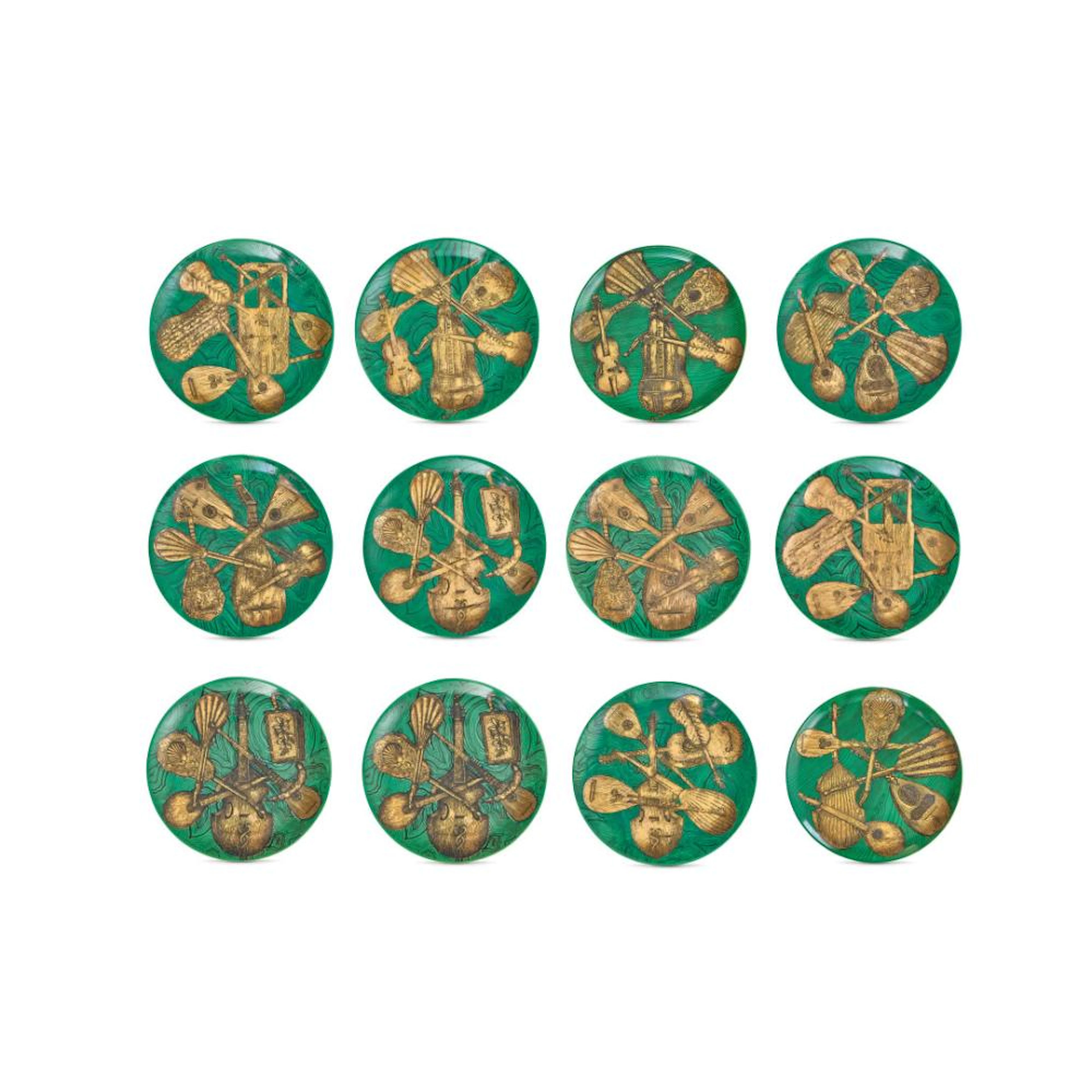 PIERO FORNASETTI 1913-1988 Dodici piatti ?Strumenti...