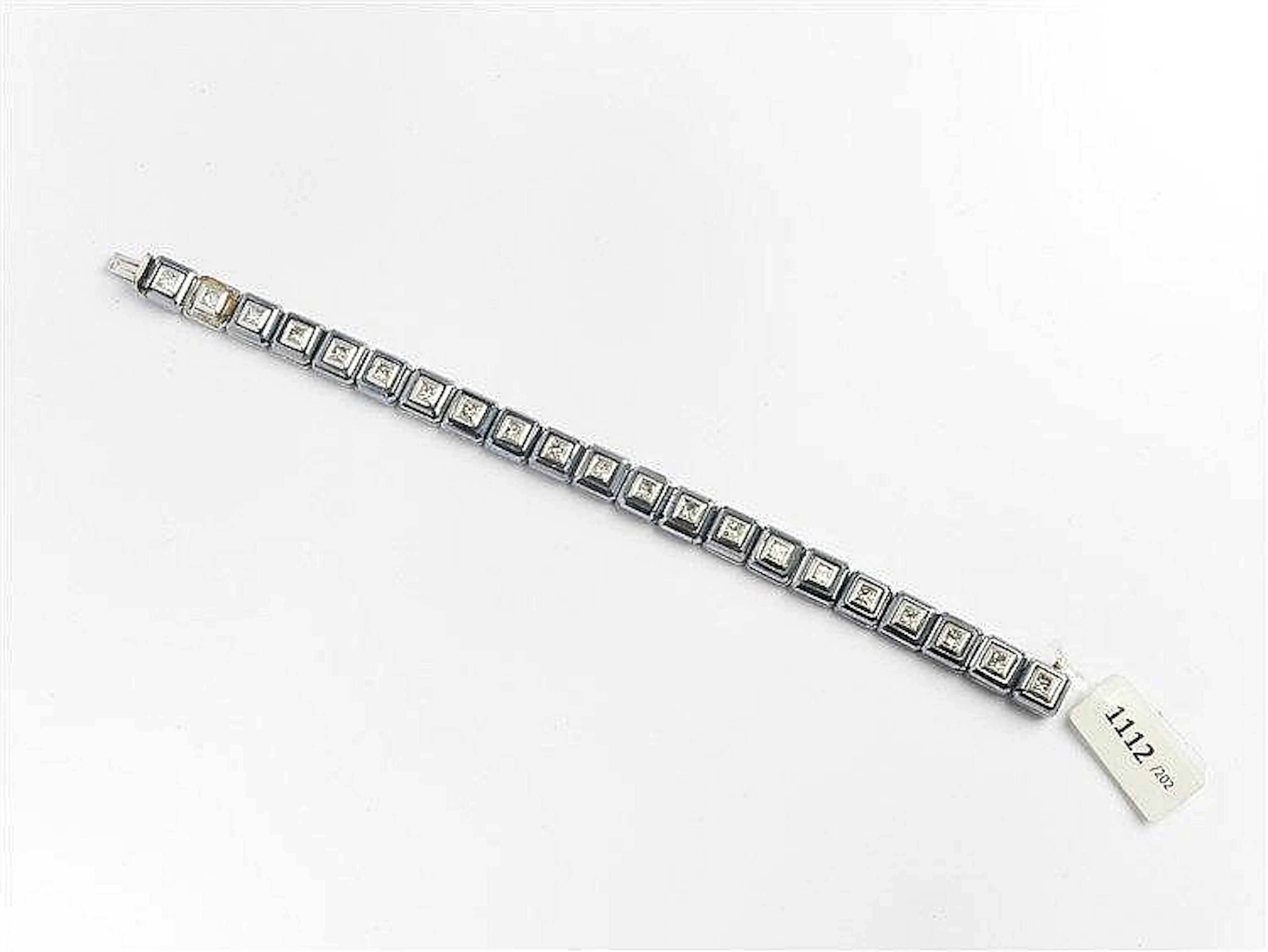 BRACCIALE IN DIAMANTI ED EMATITI DIAMOND AND HAEMATITE BRACELET