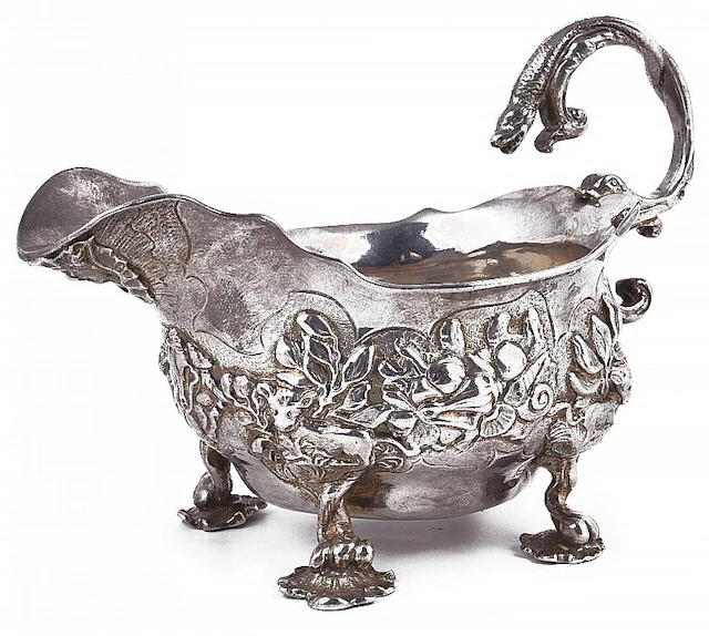 A GEORGE II SILVER CREAM BOAT