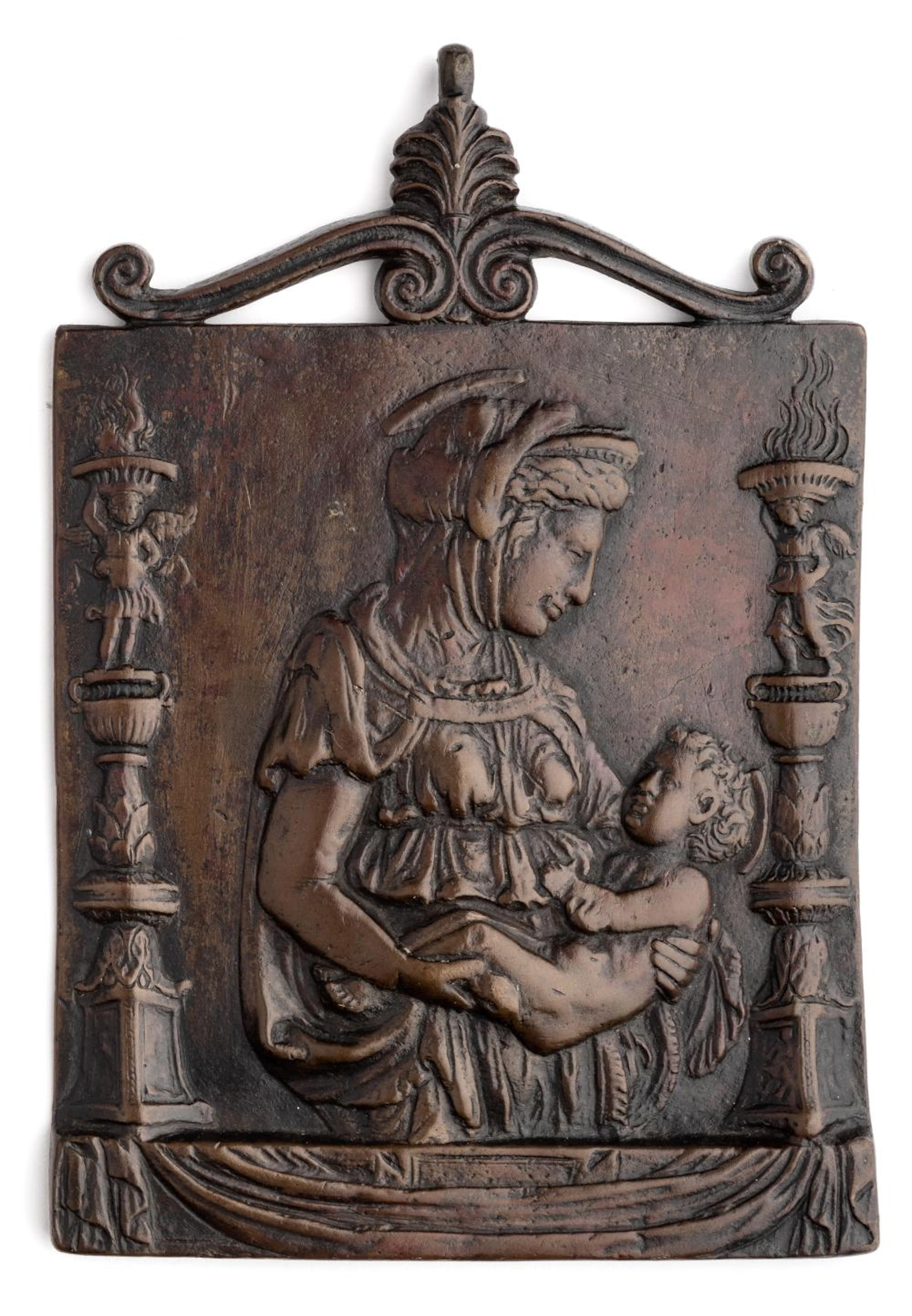 ? AN ITALIAN BRONZE PLAQUETTE OF THE VIRGIN AND CHILD