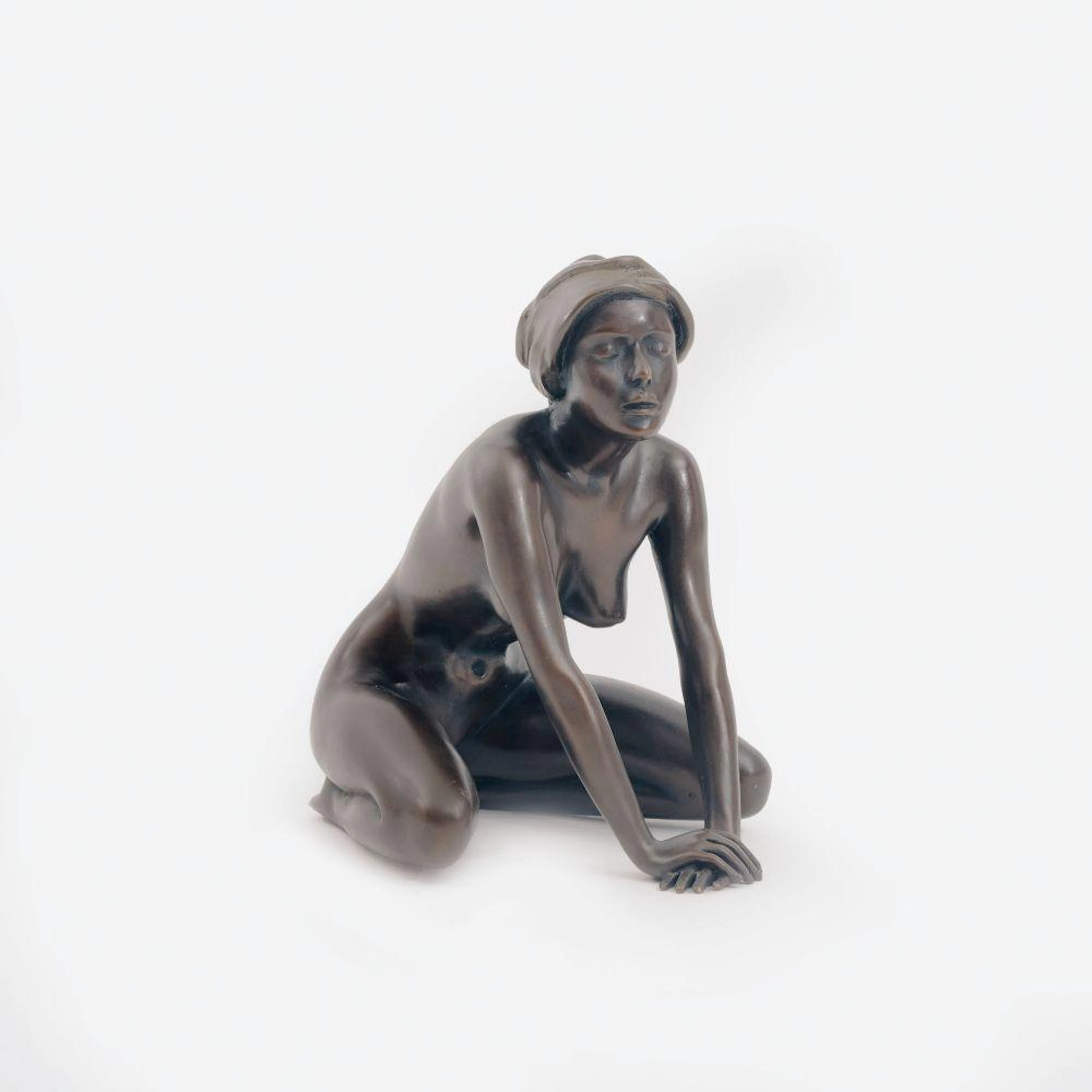 Arno Breker (Elberfeld 1900 - Düsseldorf 1991). A Kneeling Girl with Headscarf.