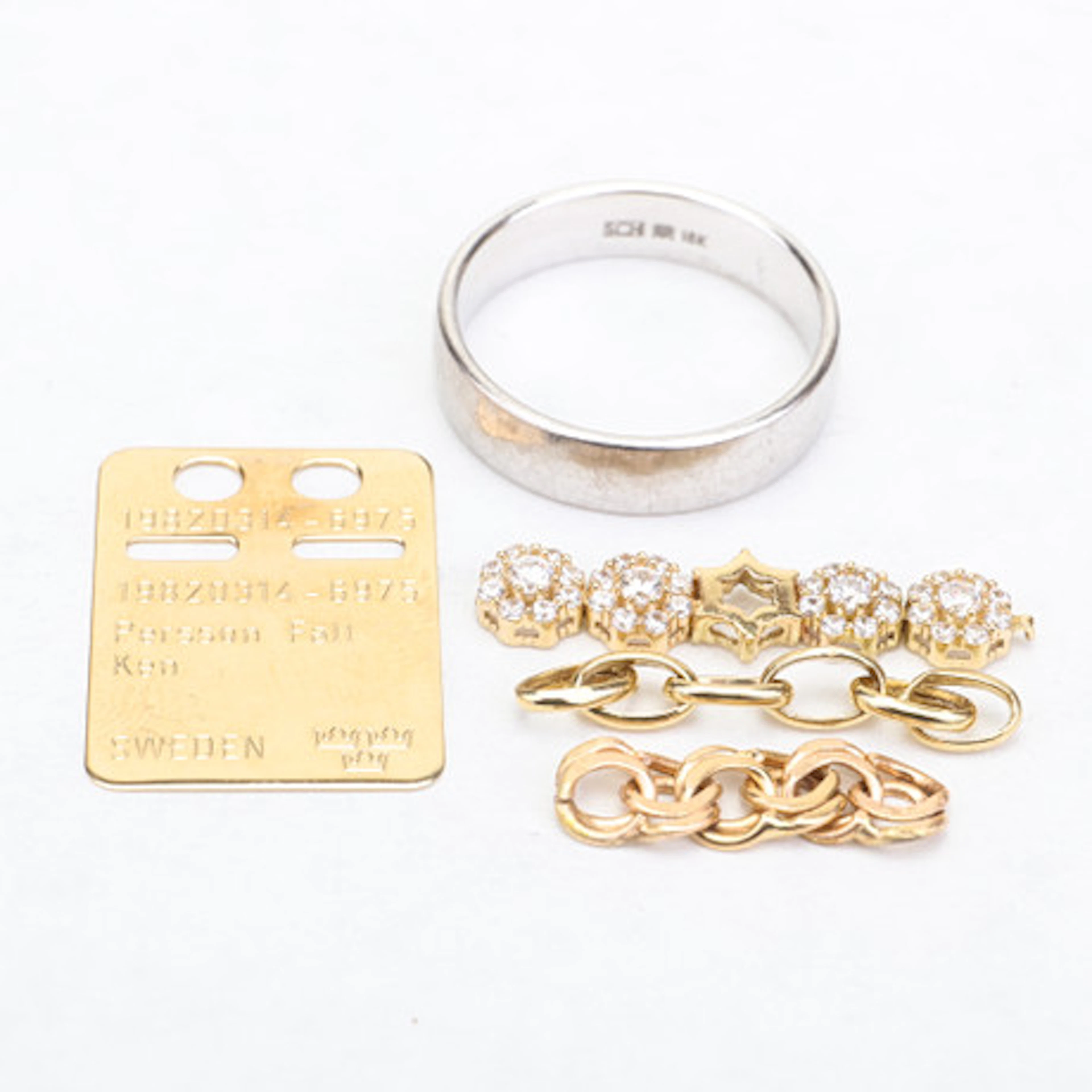 SKROTGULD, 18 k, 9 k, vikt ca 10,21 gram.