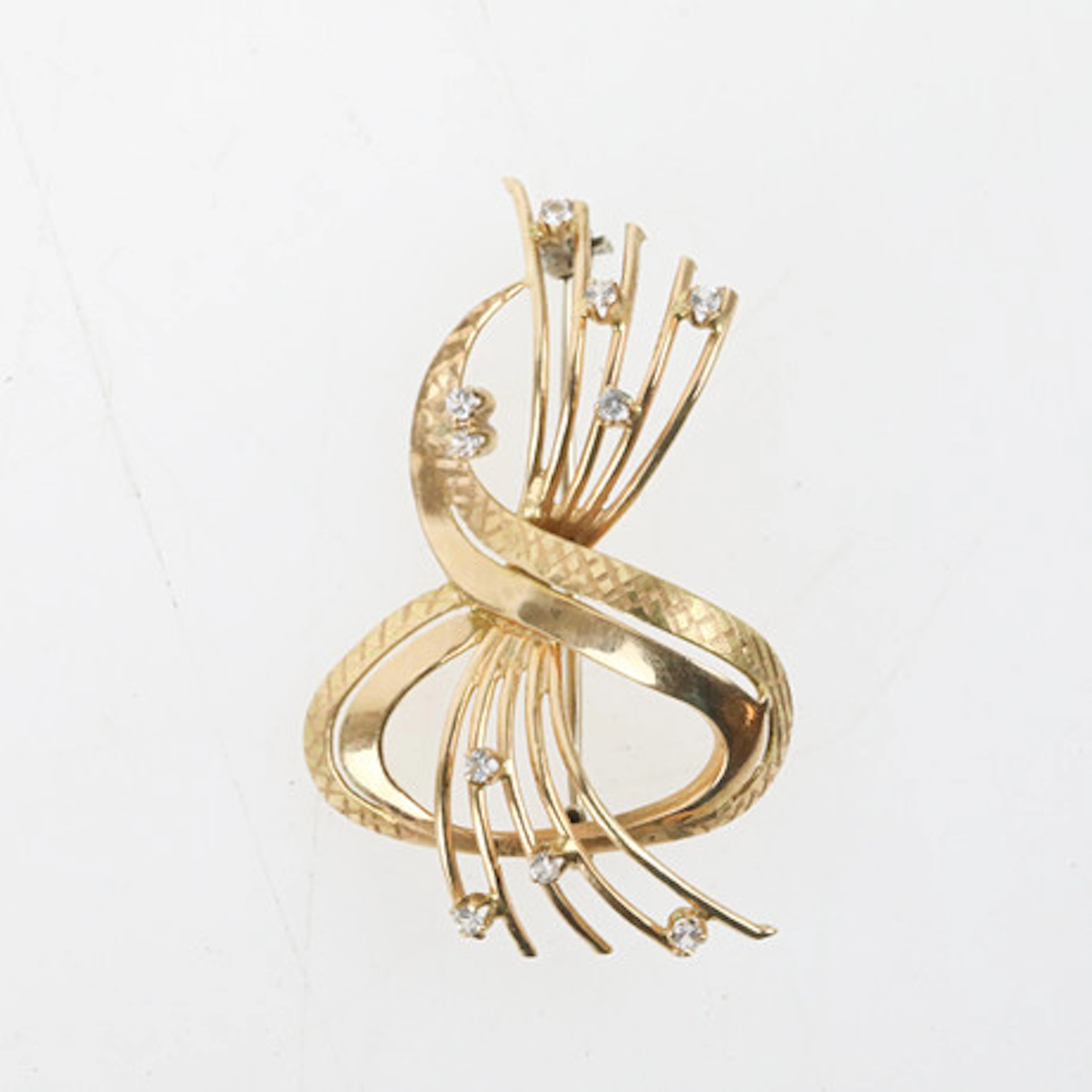 BROSCH, guld, 750, 18 k med vita 10 st ste…