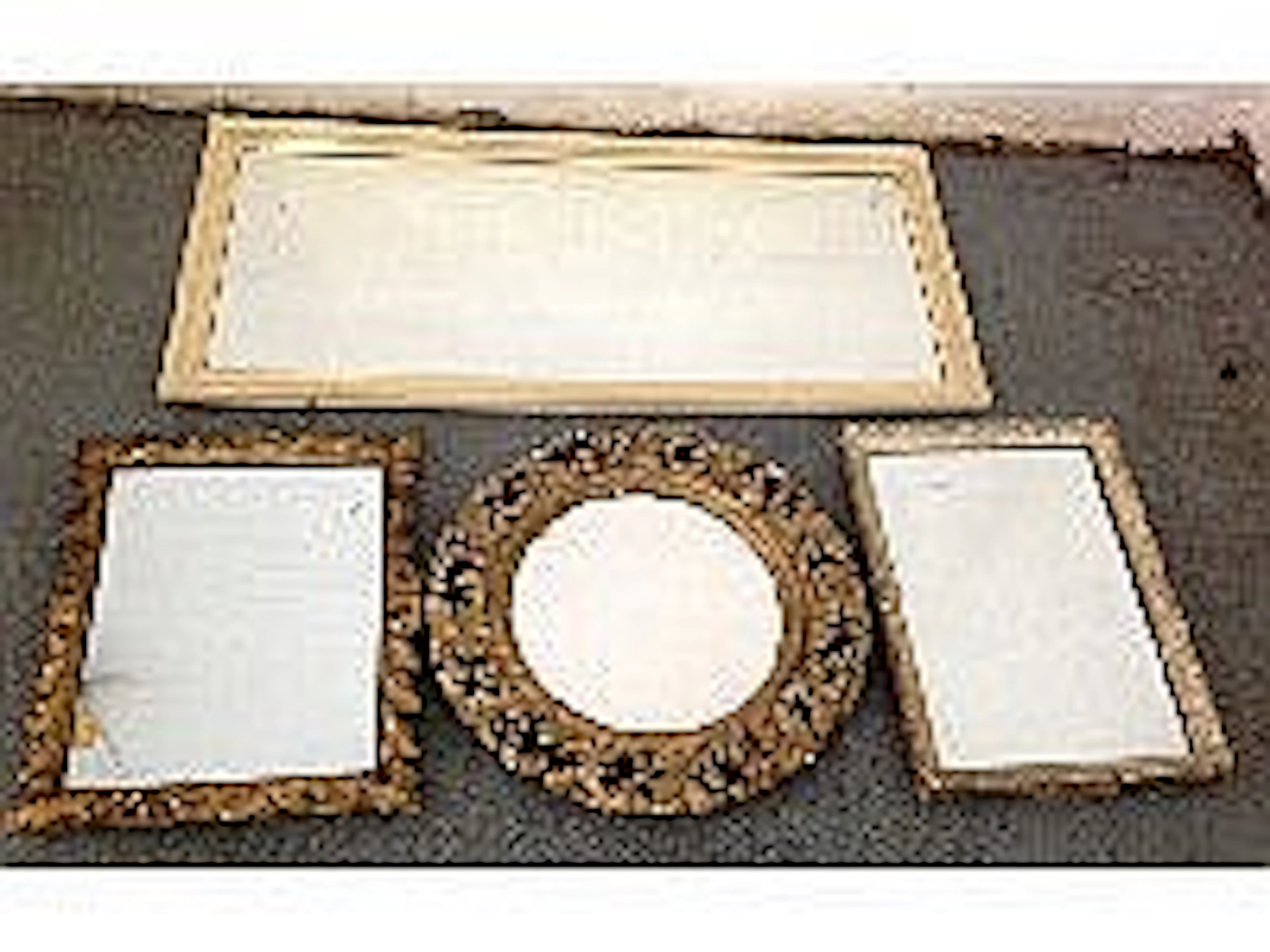 Four gilt mirrors