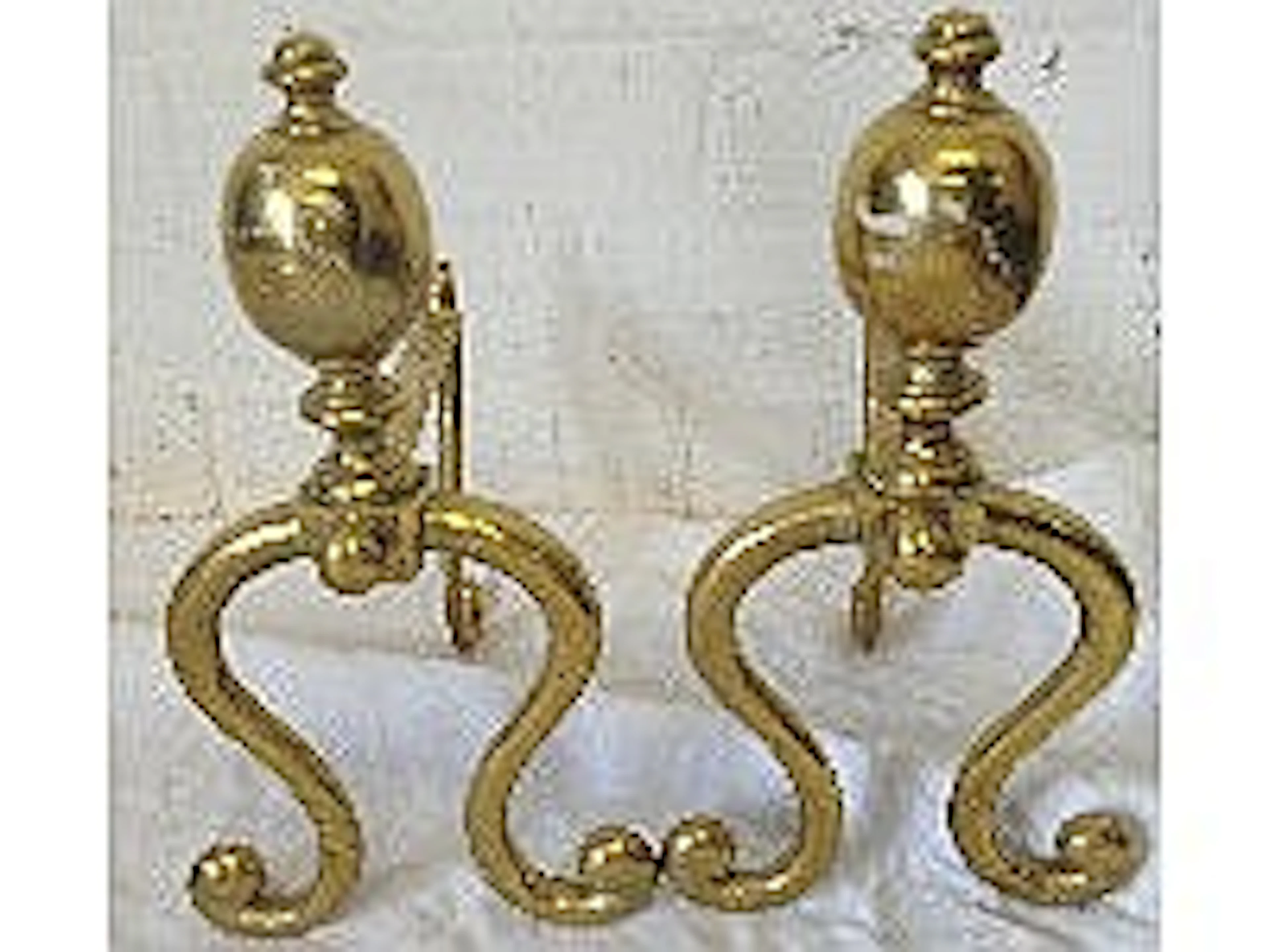 Pair brass fire dogs