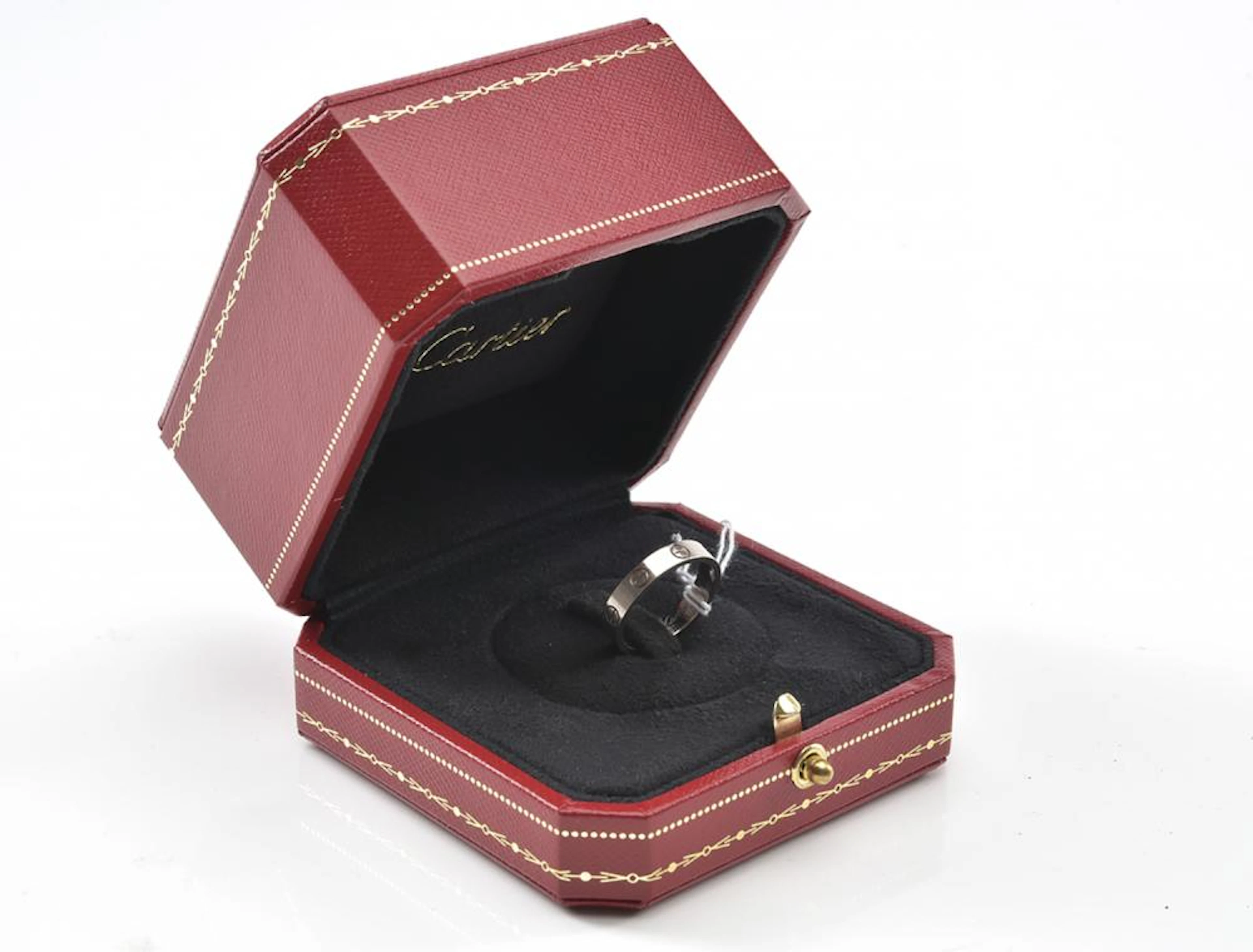 A WEDDING BAND BY CARTIER FROM THE LOVE COLLECTION