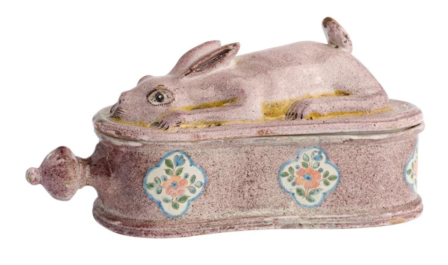 A BRUSSELS FAIENCE GAME PIE DISH AND COVER IN FORM OF A RABBIT