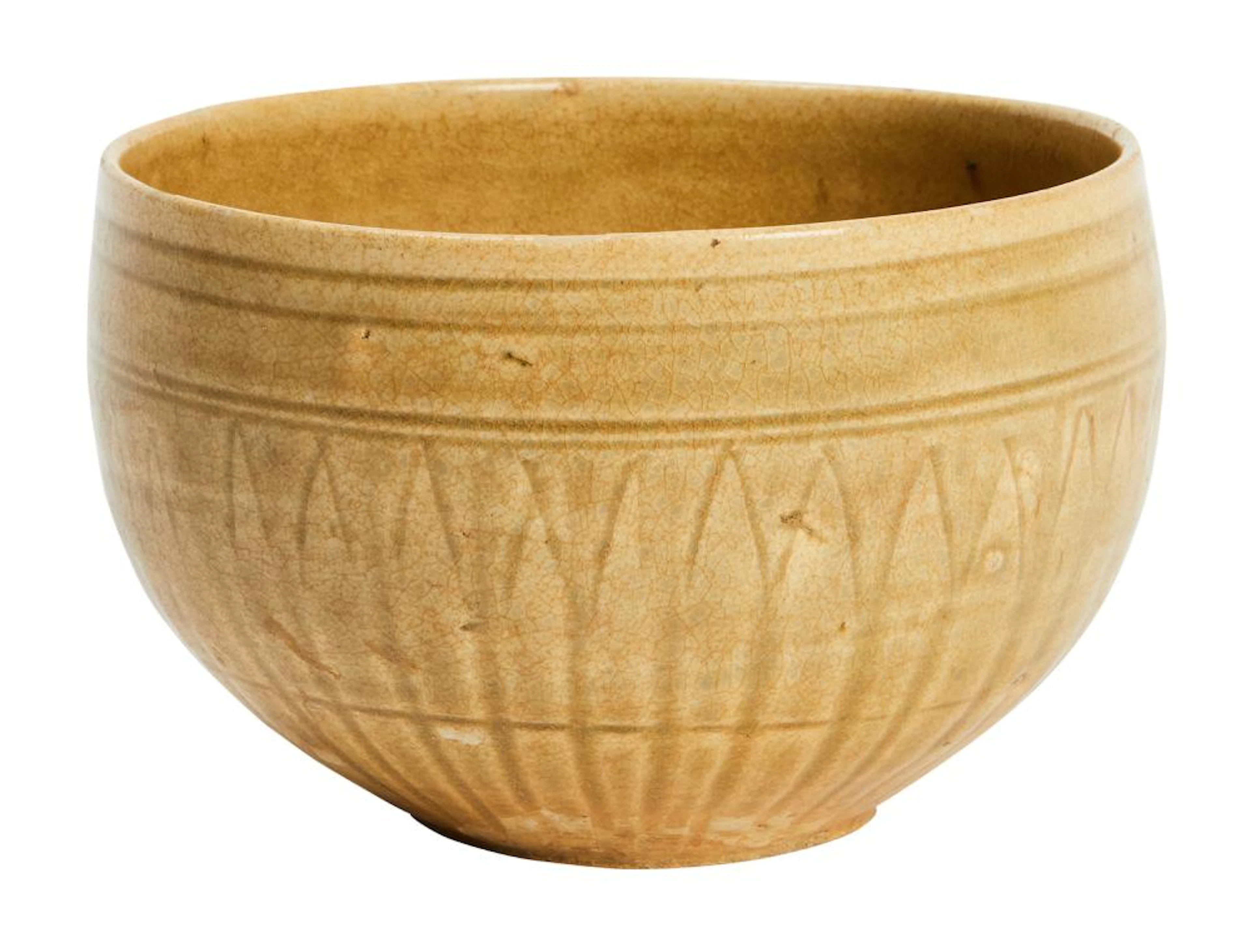 A VIETNAMESE CARVED CELADON ALMS BOWL