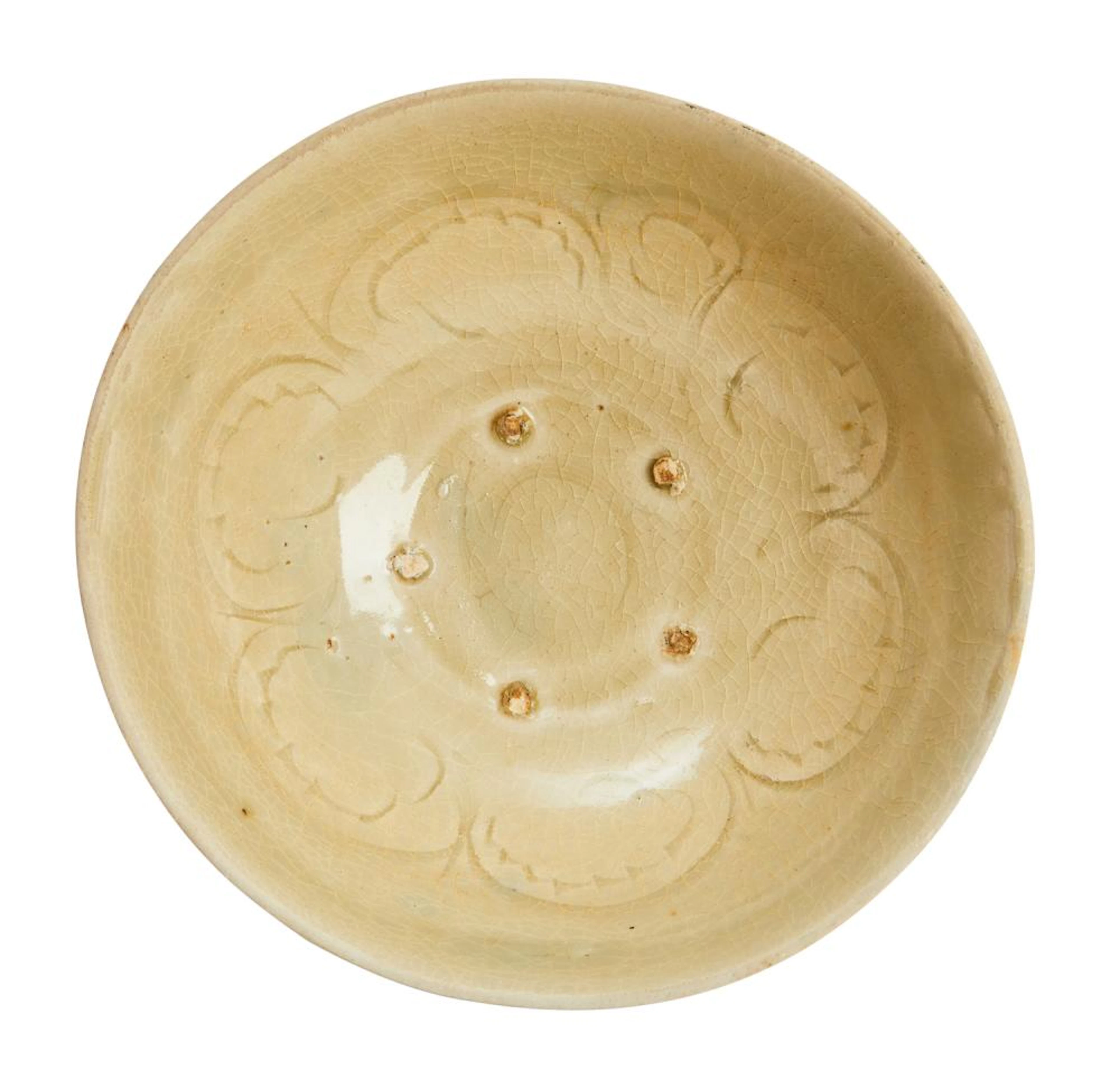A VIETNAMESE CARVED CELADON BOWL