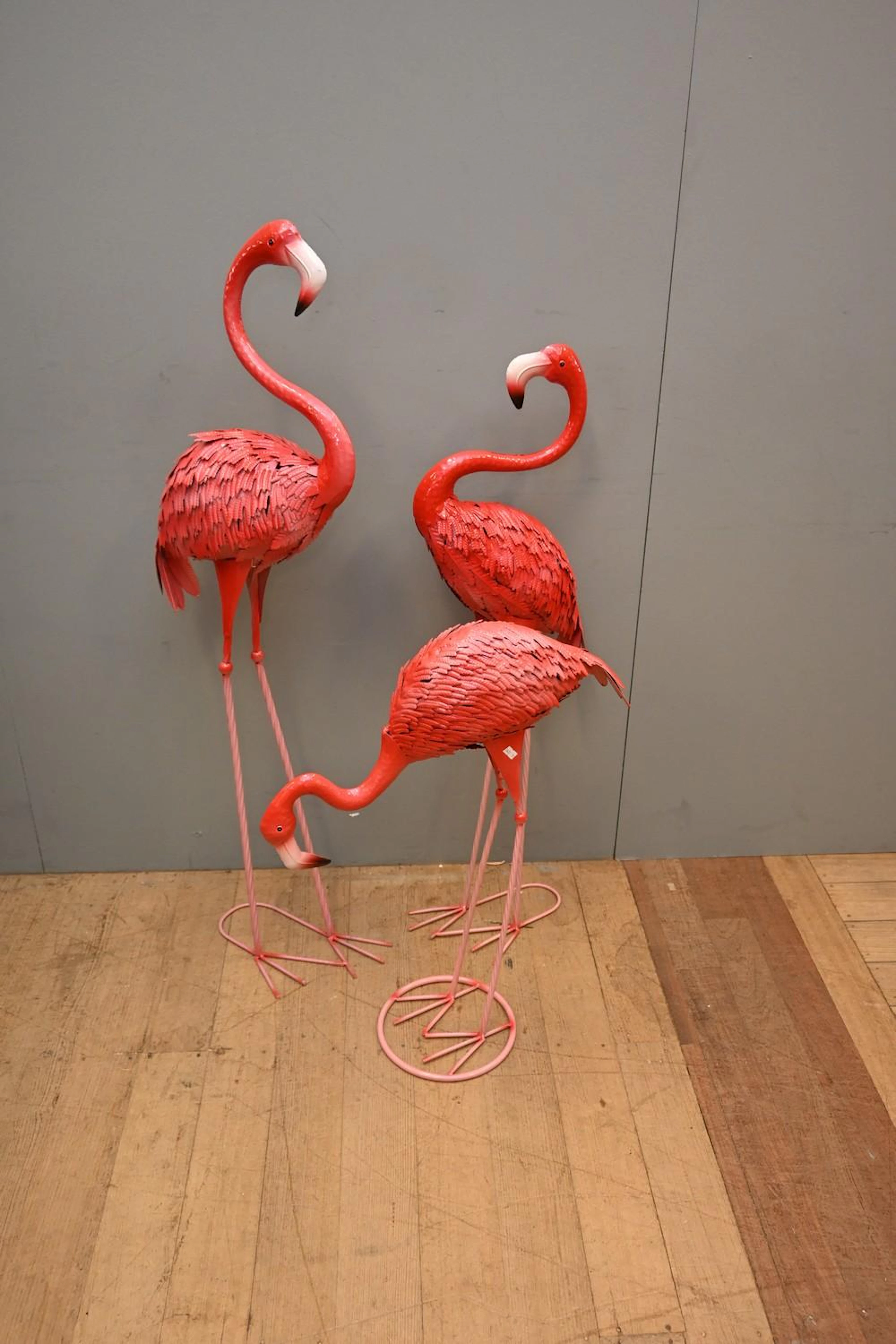 A SET OF THREE METAL FLAMINGOES (123H CM) (LEONARD JOEL DELIVERY SIZE: LARGE)