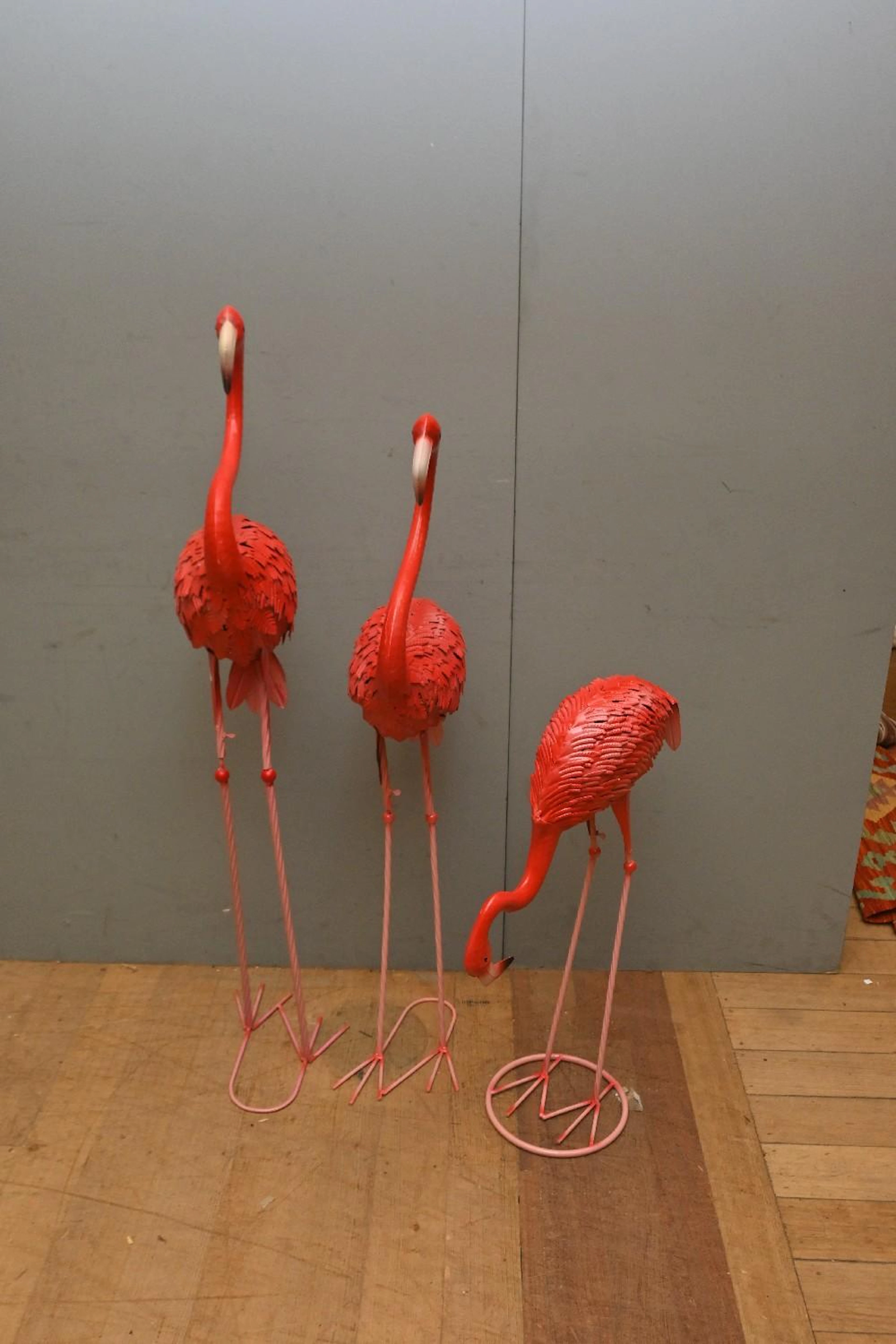 A SET OF THREE METAL GARDEN FLAMINGOS (122H CM) (LEONARD...