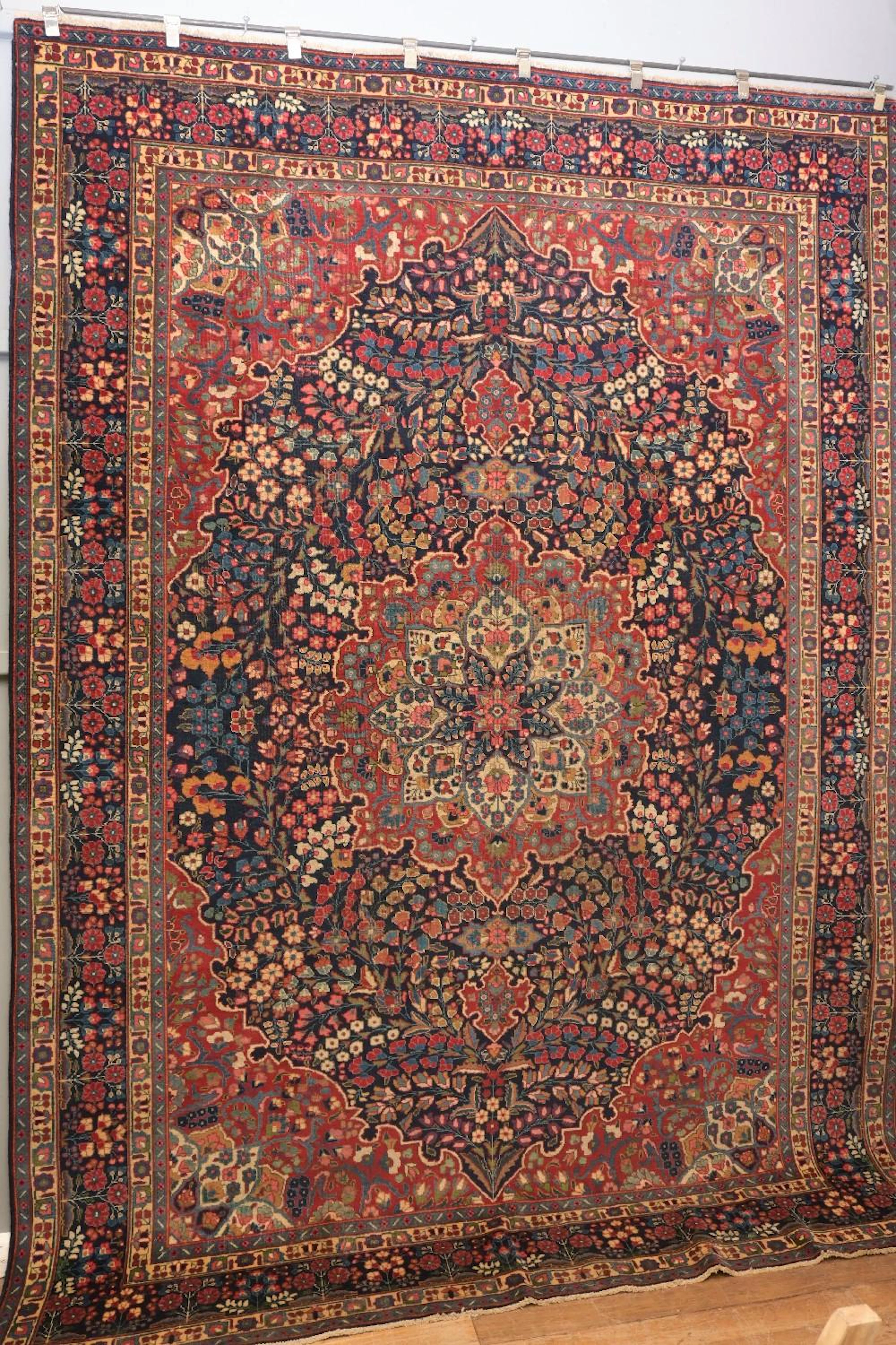 A CIRCA 1940?S PERSIAN TABRIZ ANTIQUE CARPET