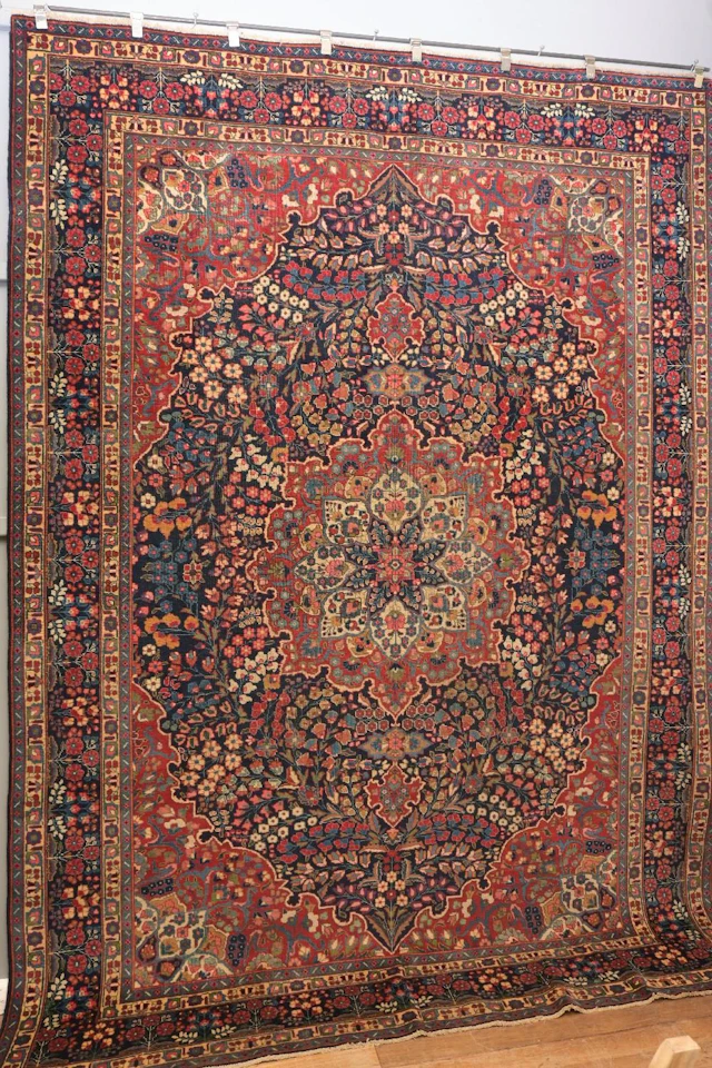 A CIRCA 1940?S PERSIAN TABRIZ ANTIQUE CARPET