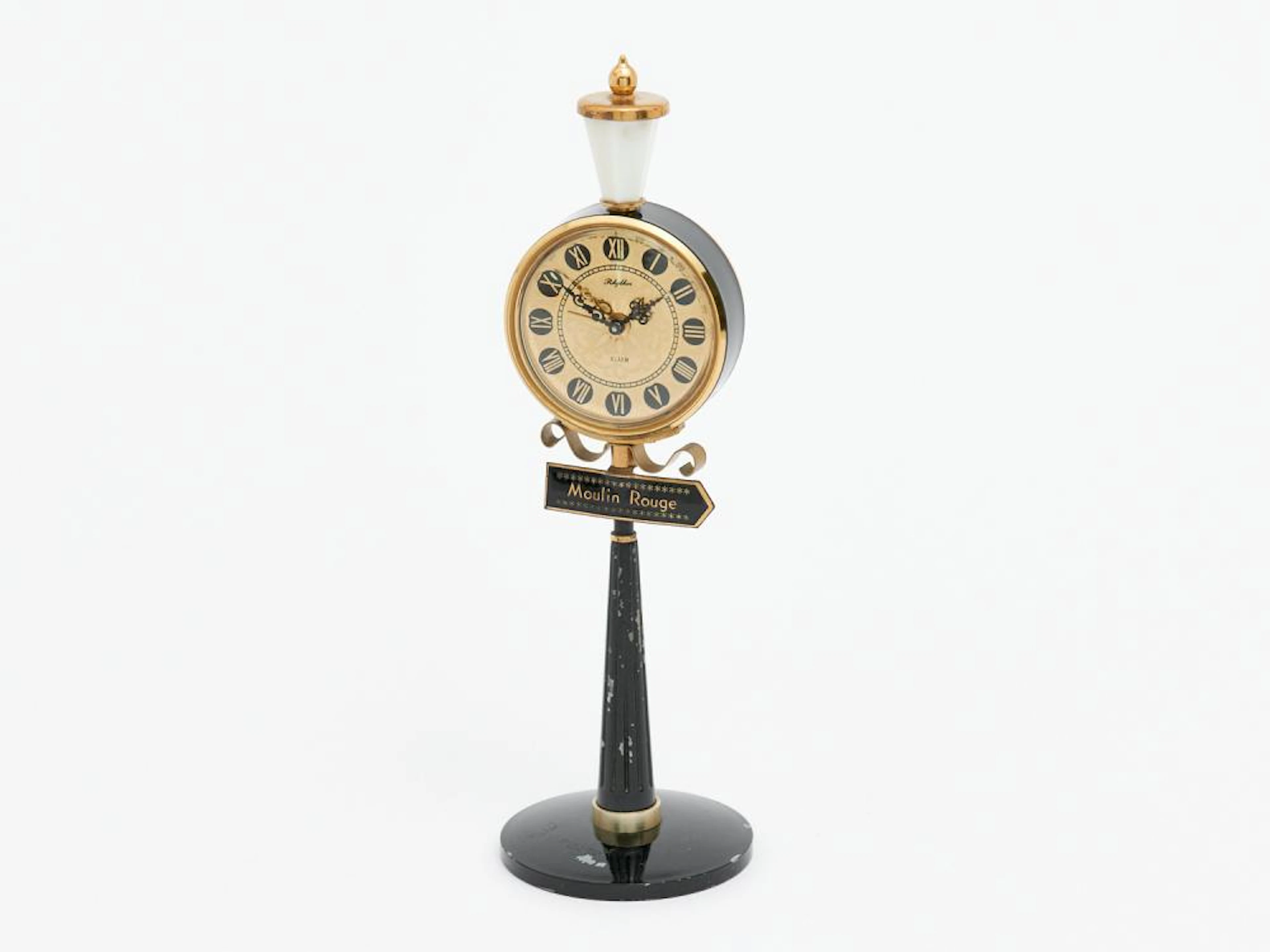 A SWISS MADE RHYTHM MOULIN ROUGE BLACK METAL AND BRASS LAMP POST CLOCK