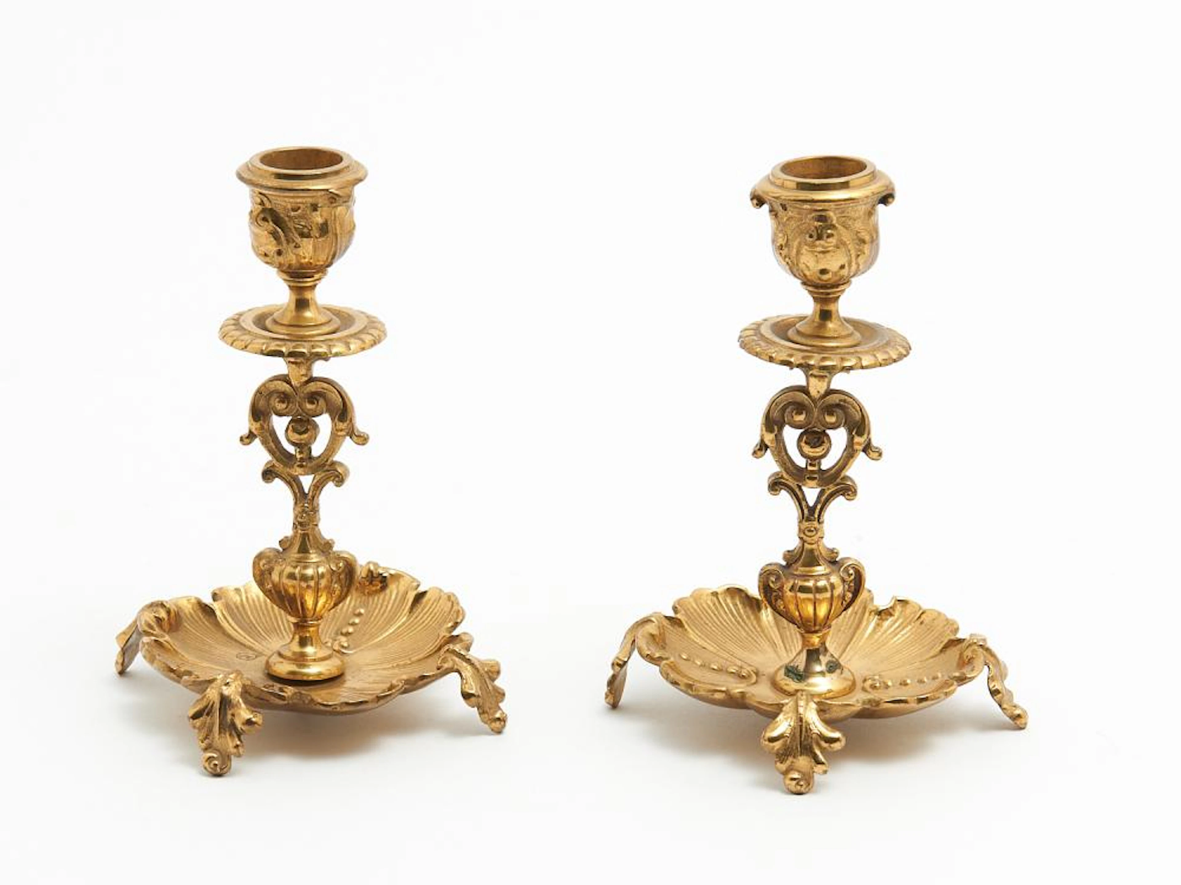 A PAIR OF SMALL BRASS CANDELSTICKS
