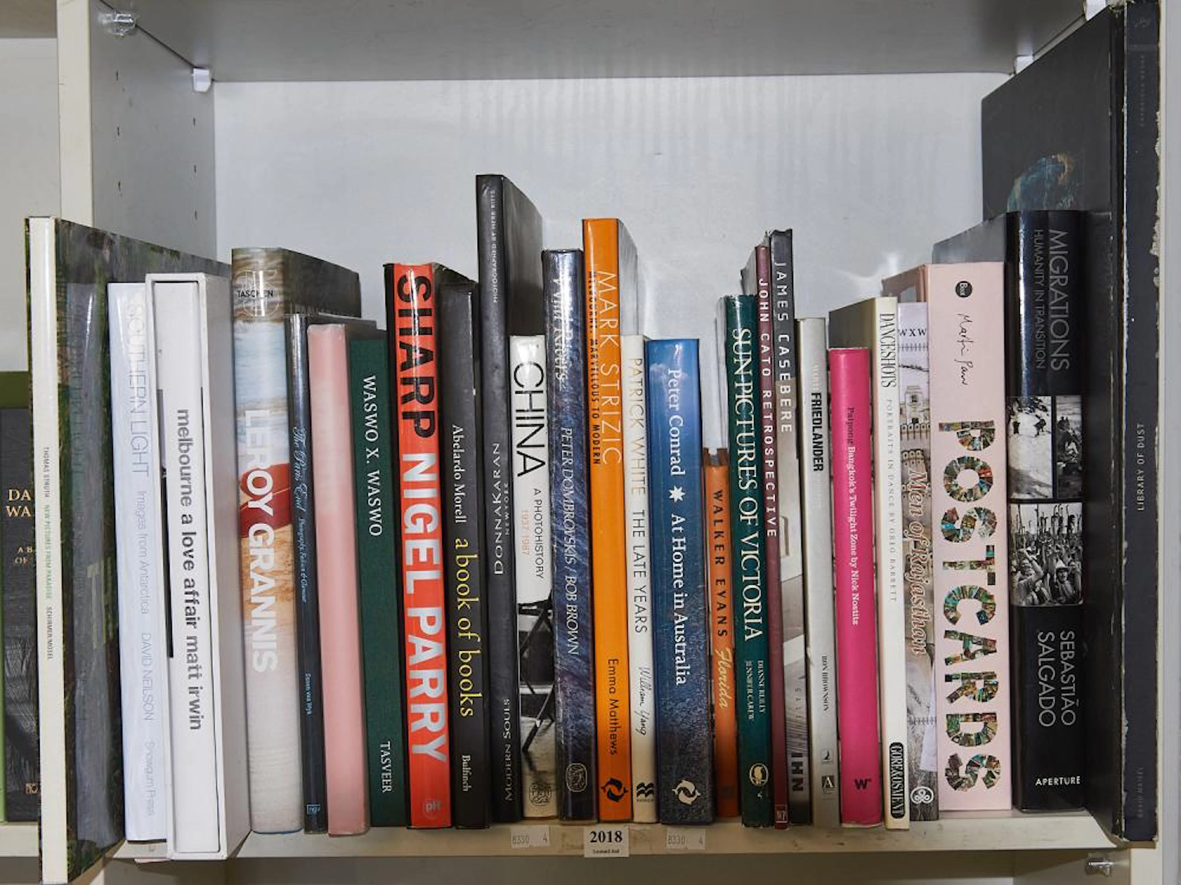 SHELF OF PHOTOGRAPHY INCLUDING MARK STRIZC