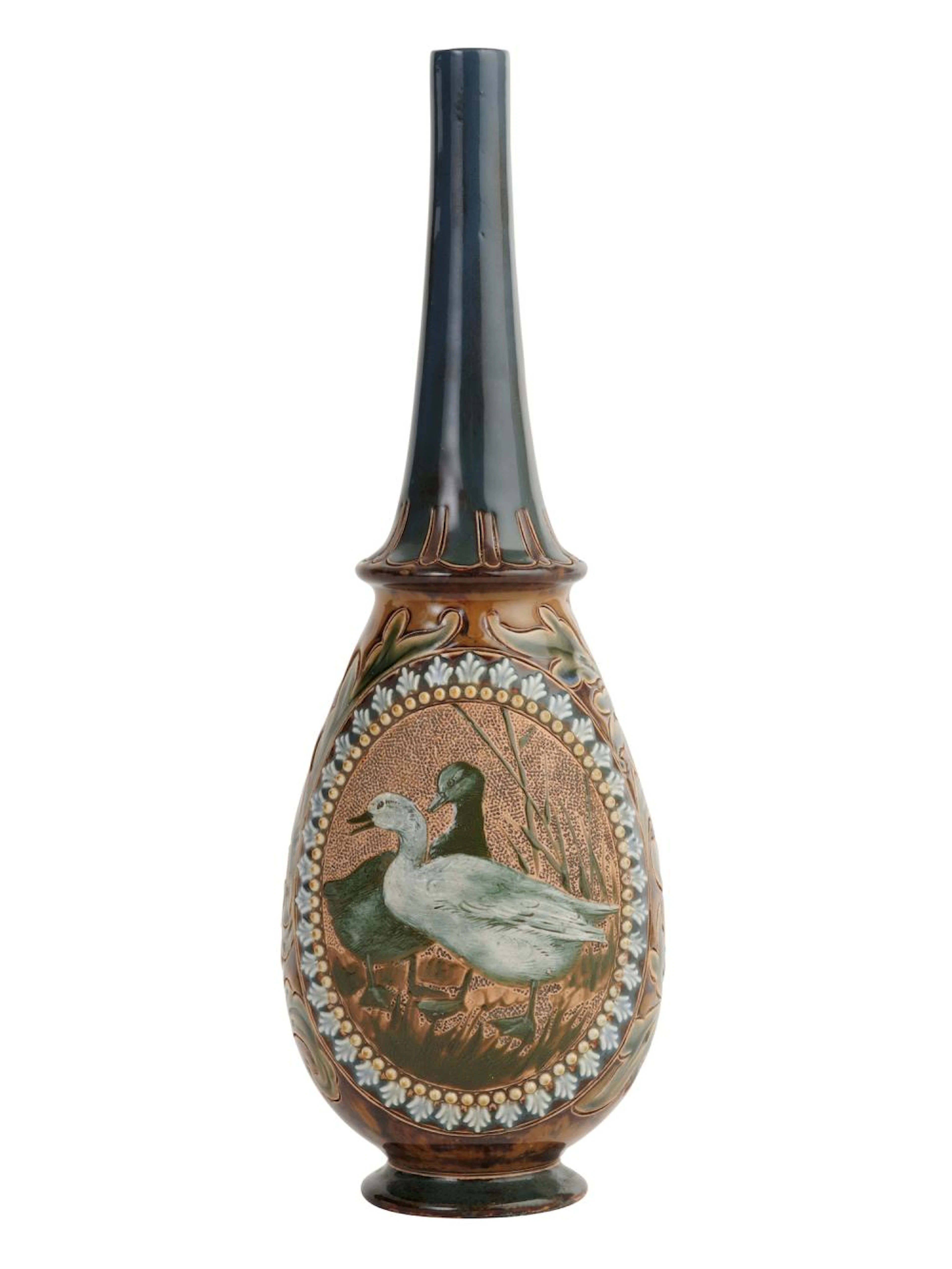 A DOULTON LAMBETH STONEWARE VASE DECORATED BY FLORENCE BARLOW & FRANCIS E
