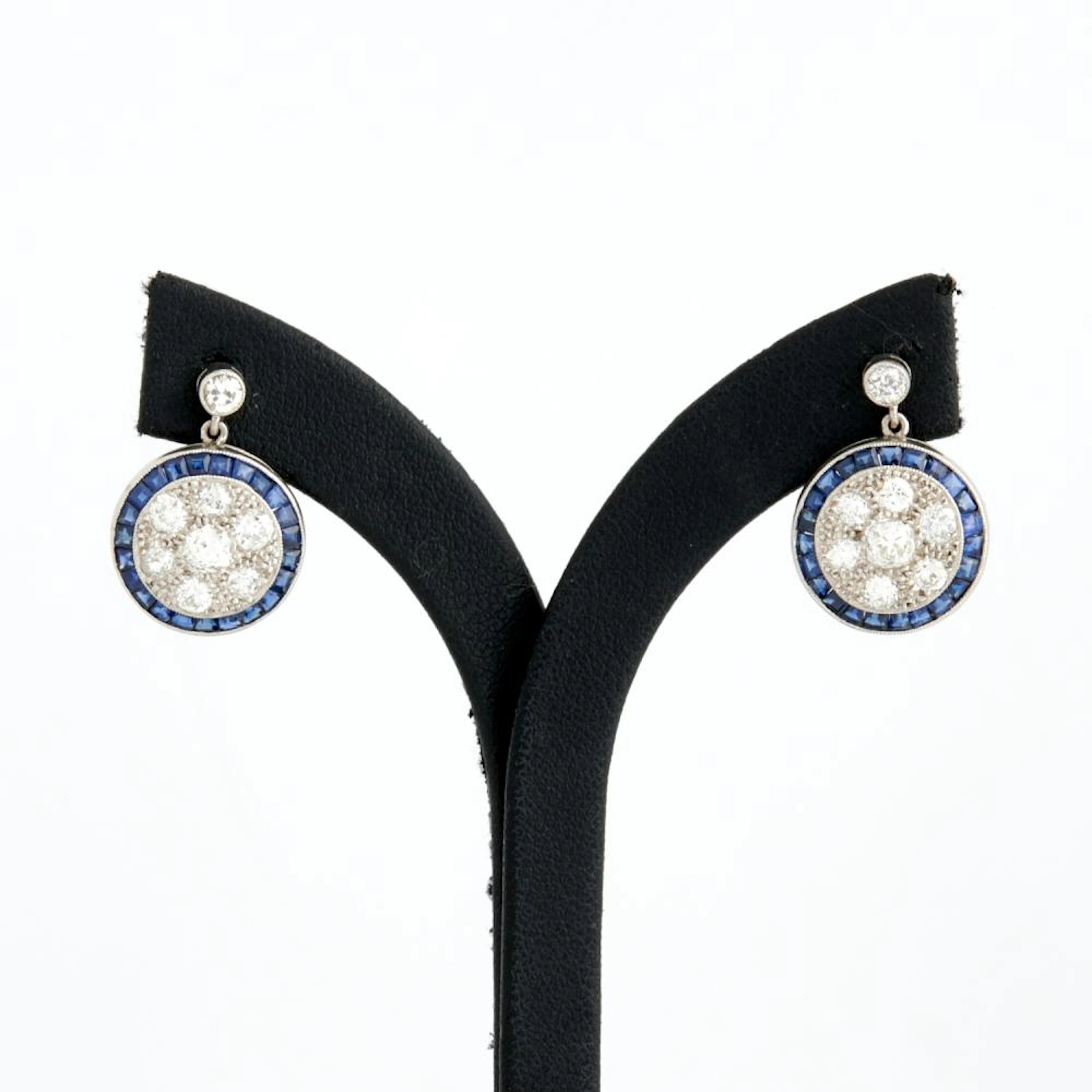 A PAIR OF SAPPHIRE AND DIAMOND EARRINGS IN PLATINUM AND PALLADIUM