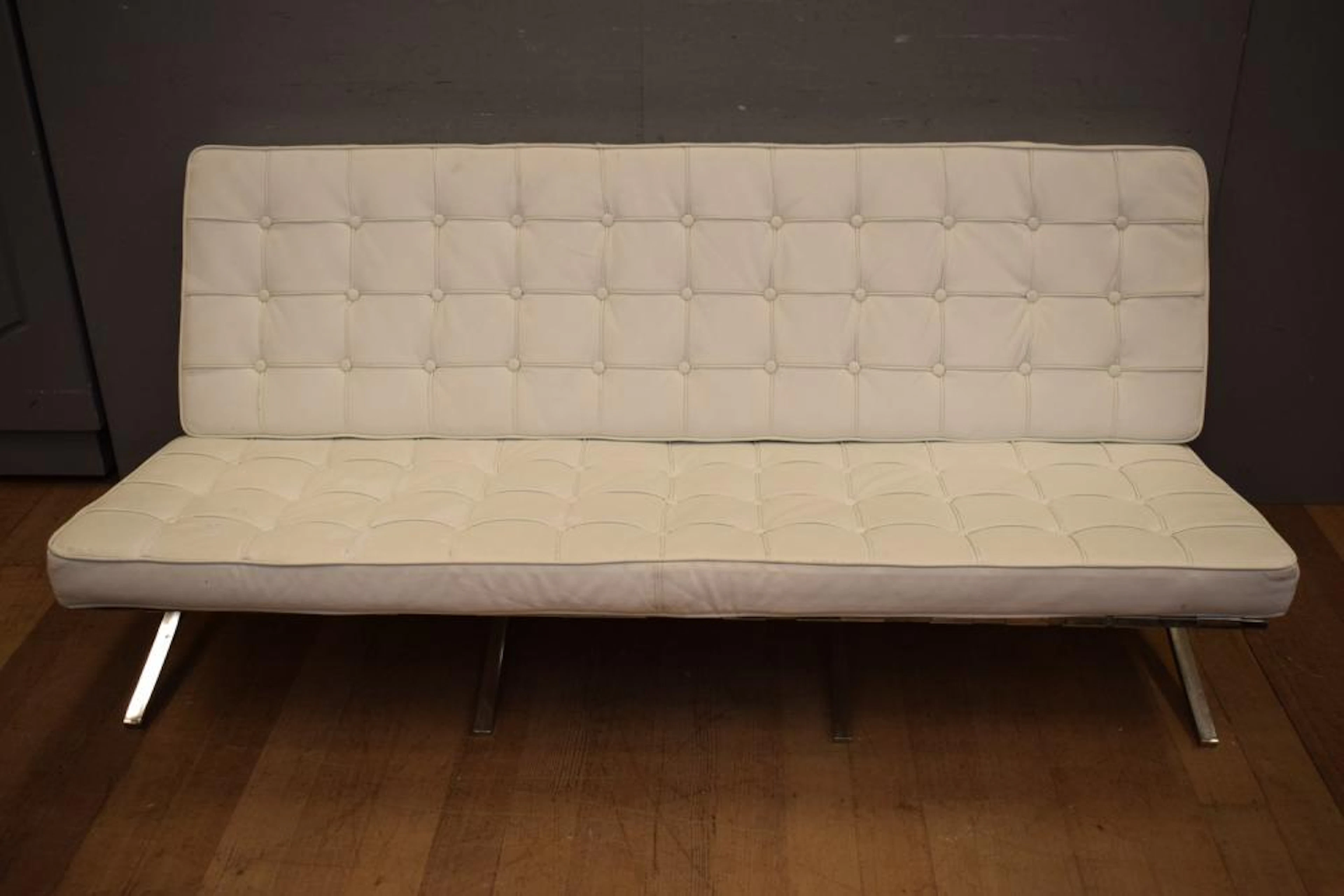 A BARCELONA STYLE FOUR SEATER VINYL SOFA (80H x 190W x...