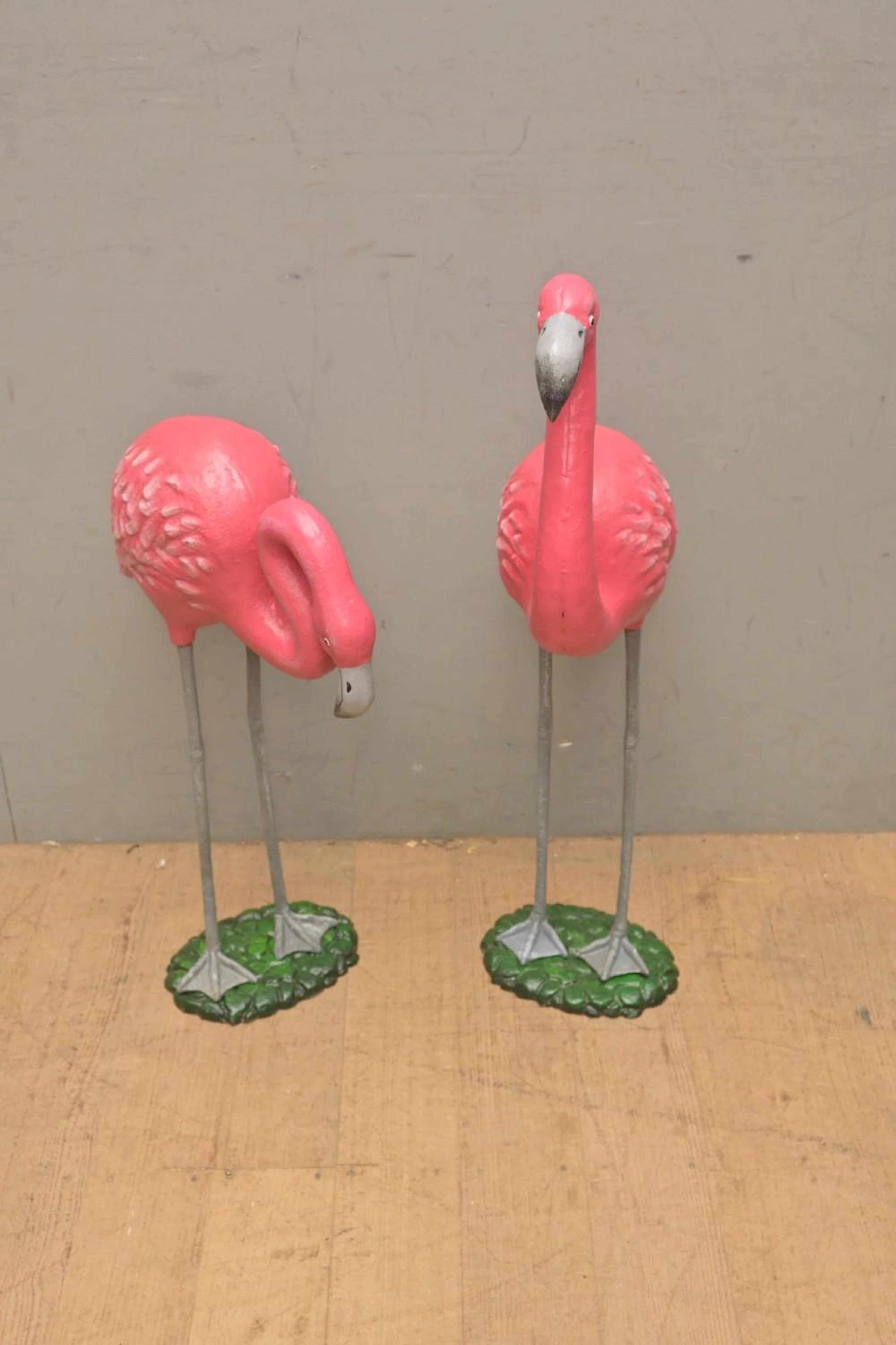 A PAIR OF CAST METAL FLAMINGOES (74H CM) (LEONARD JOEL DELIVERY SIZE: LARGE)