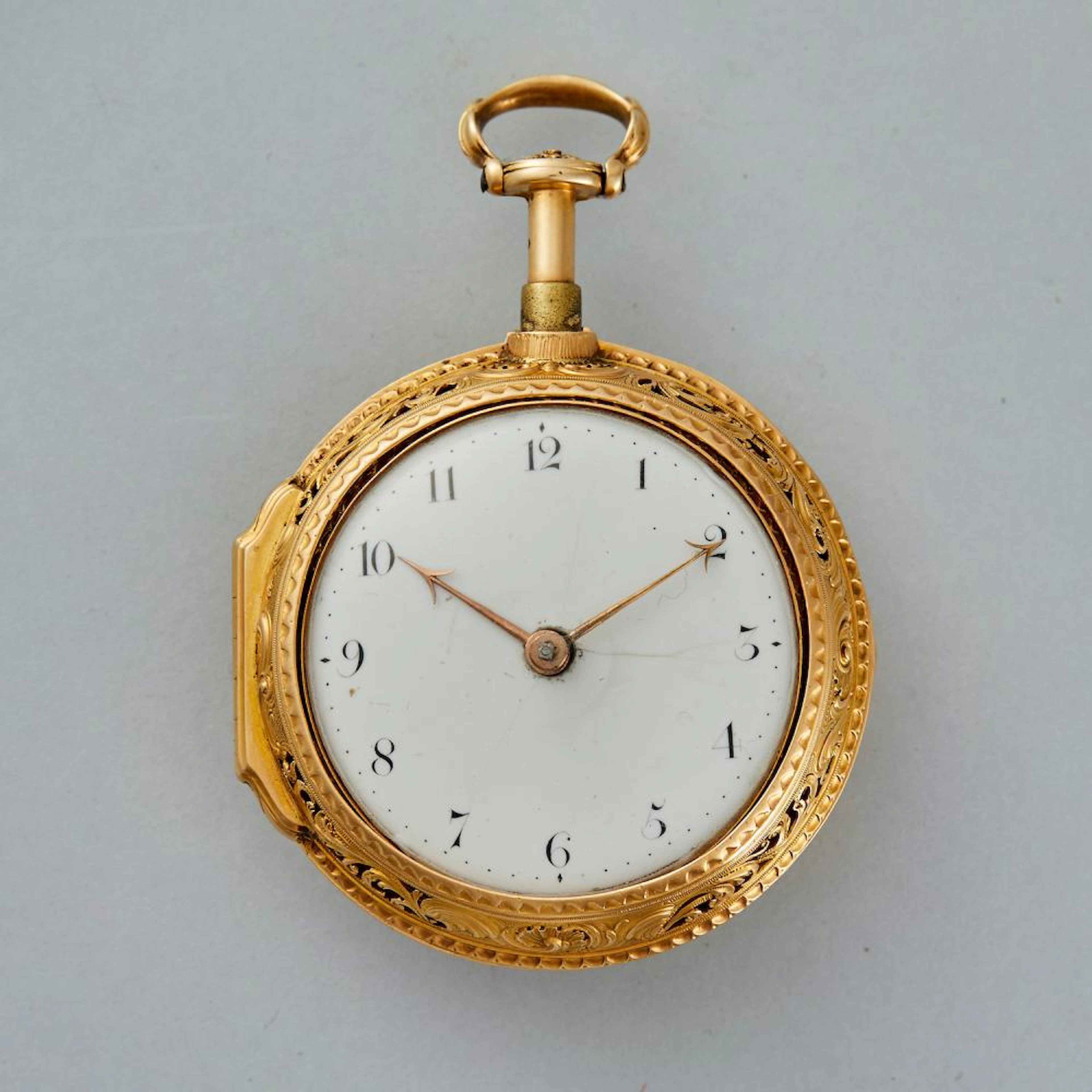 AN EARDLEY NORTON GOLD REPOUSSE QUARTER REPEATING KEY...
